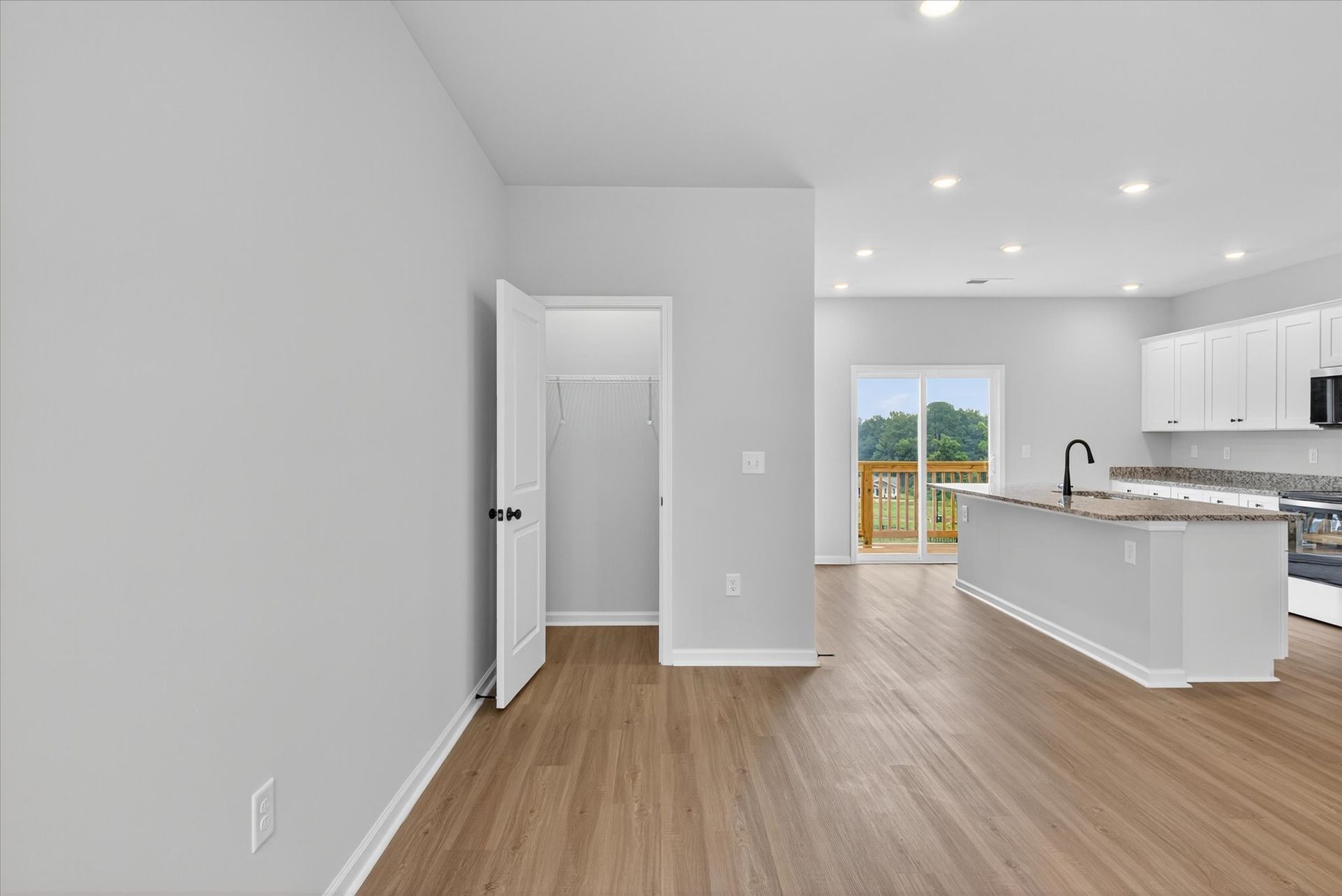 Vinyl plank flooring throughout
