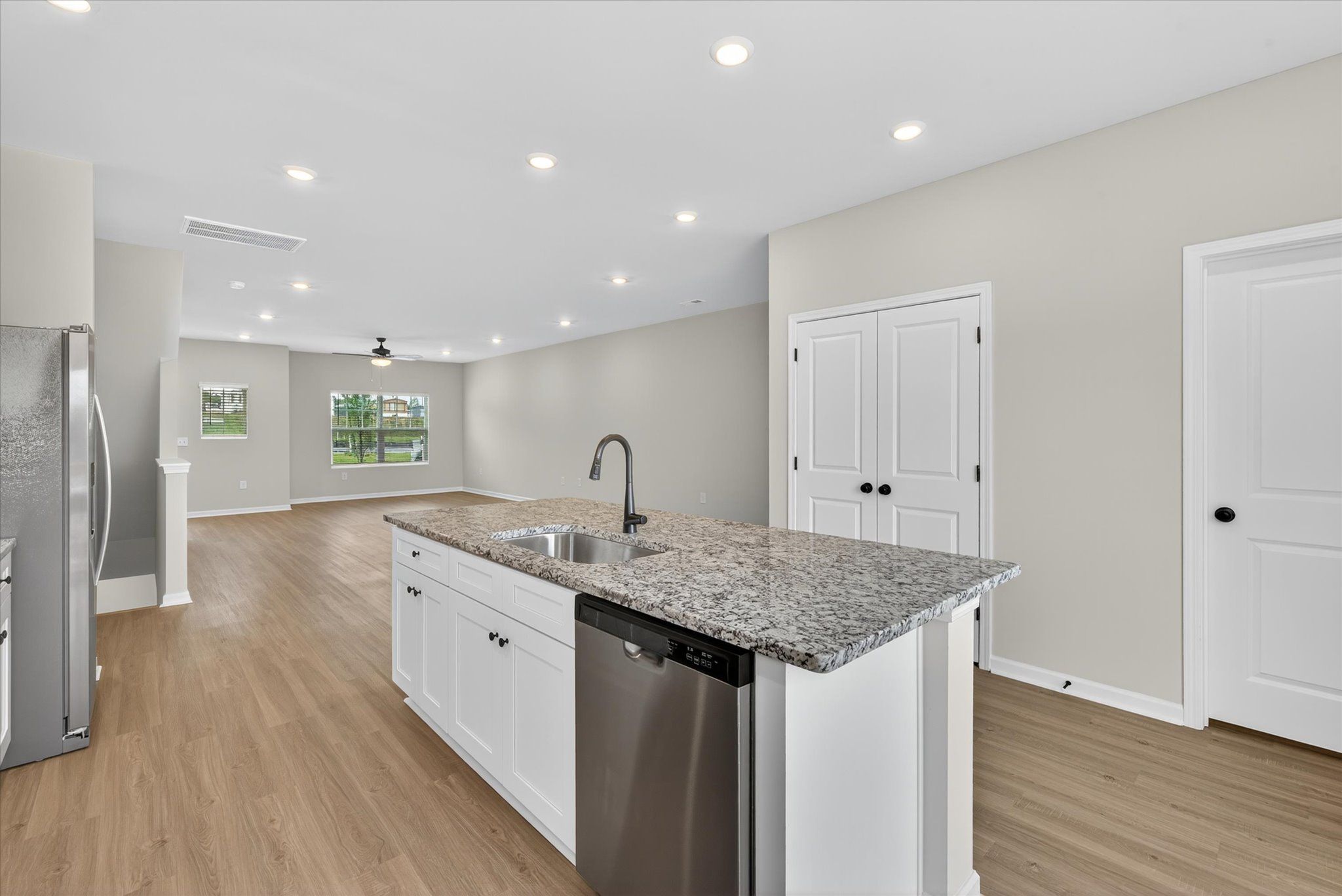 The kitchen has granite countertops. 