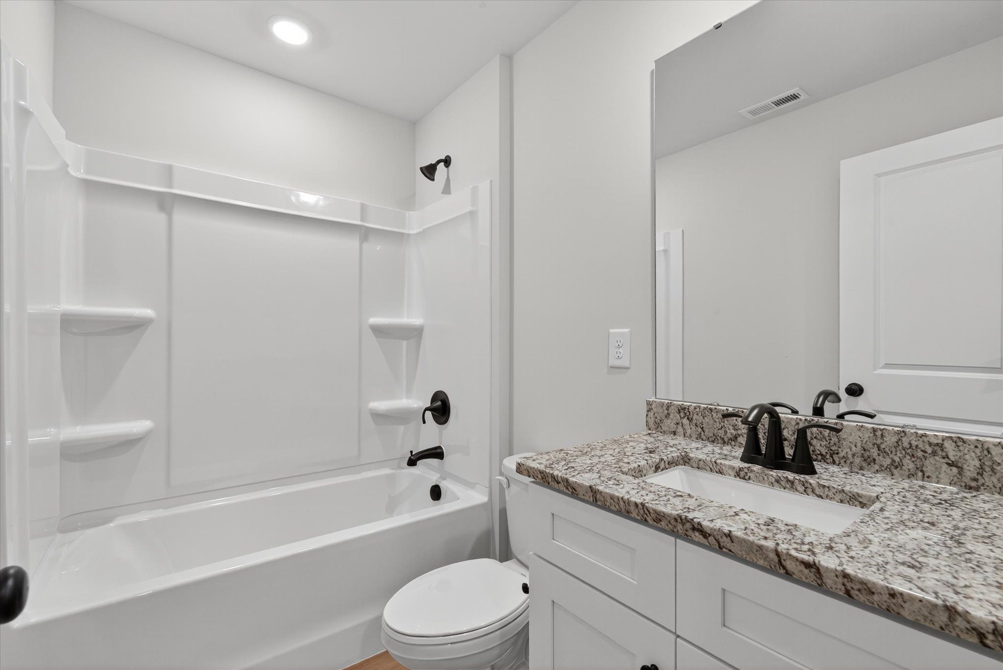 The secondary bathroom. 