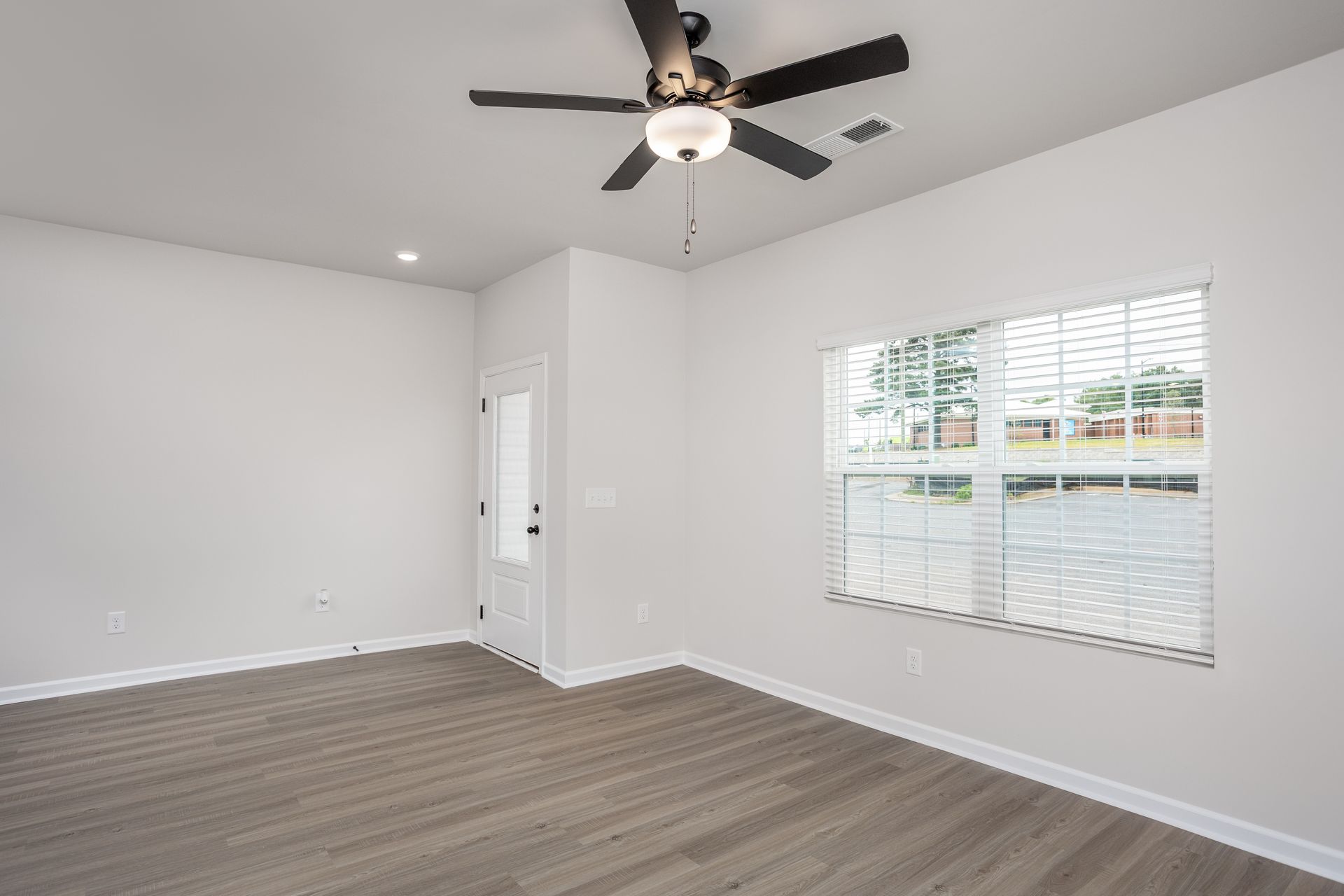 Windows let in lots of light to the living room. 