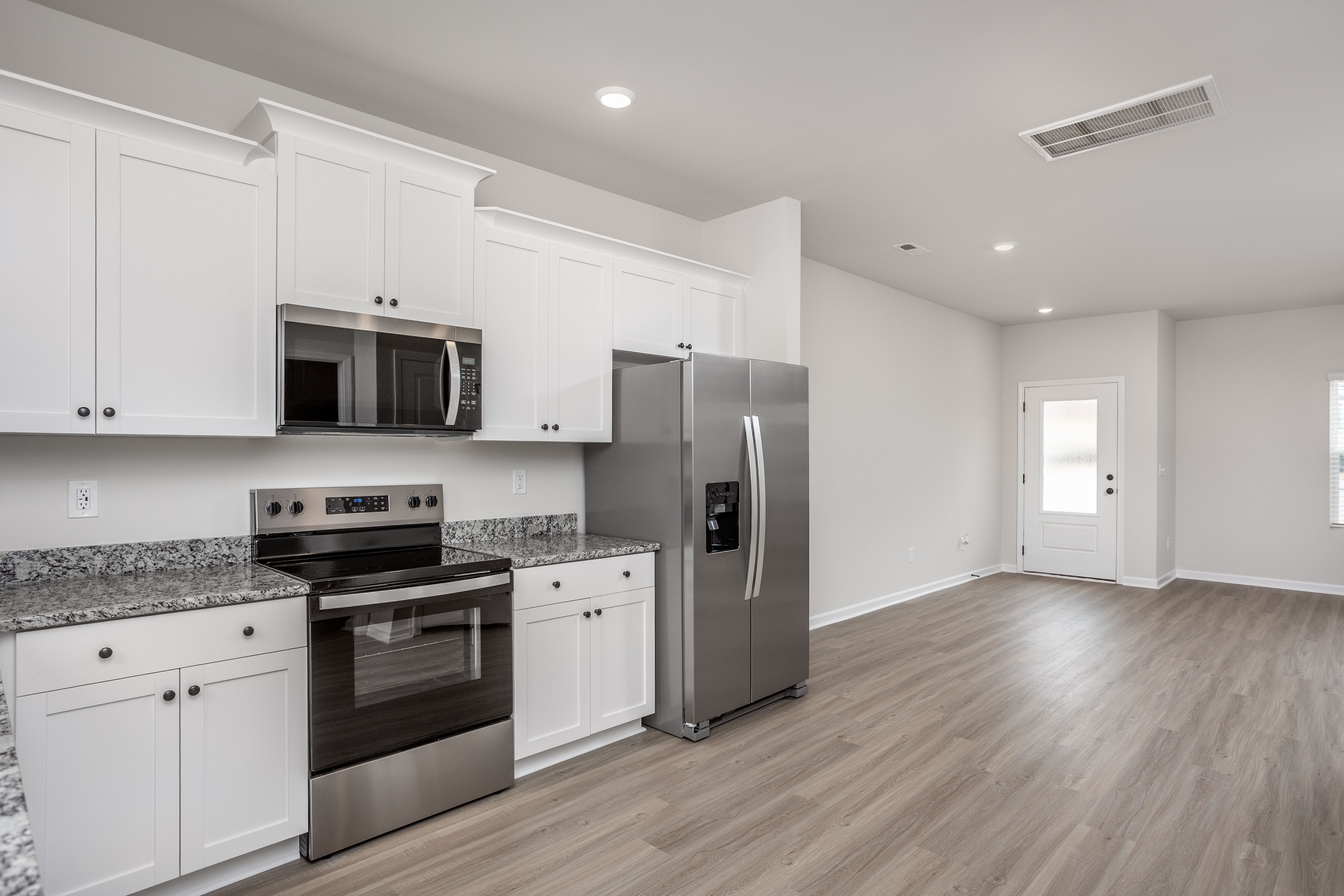 The living room connects to the kitchen. 