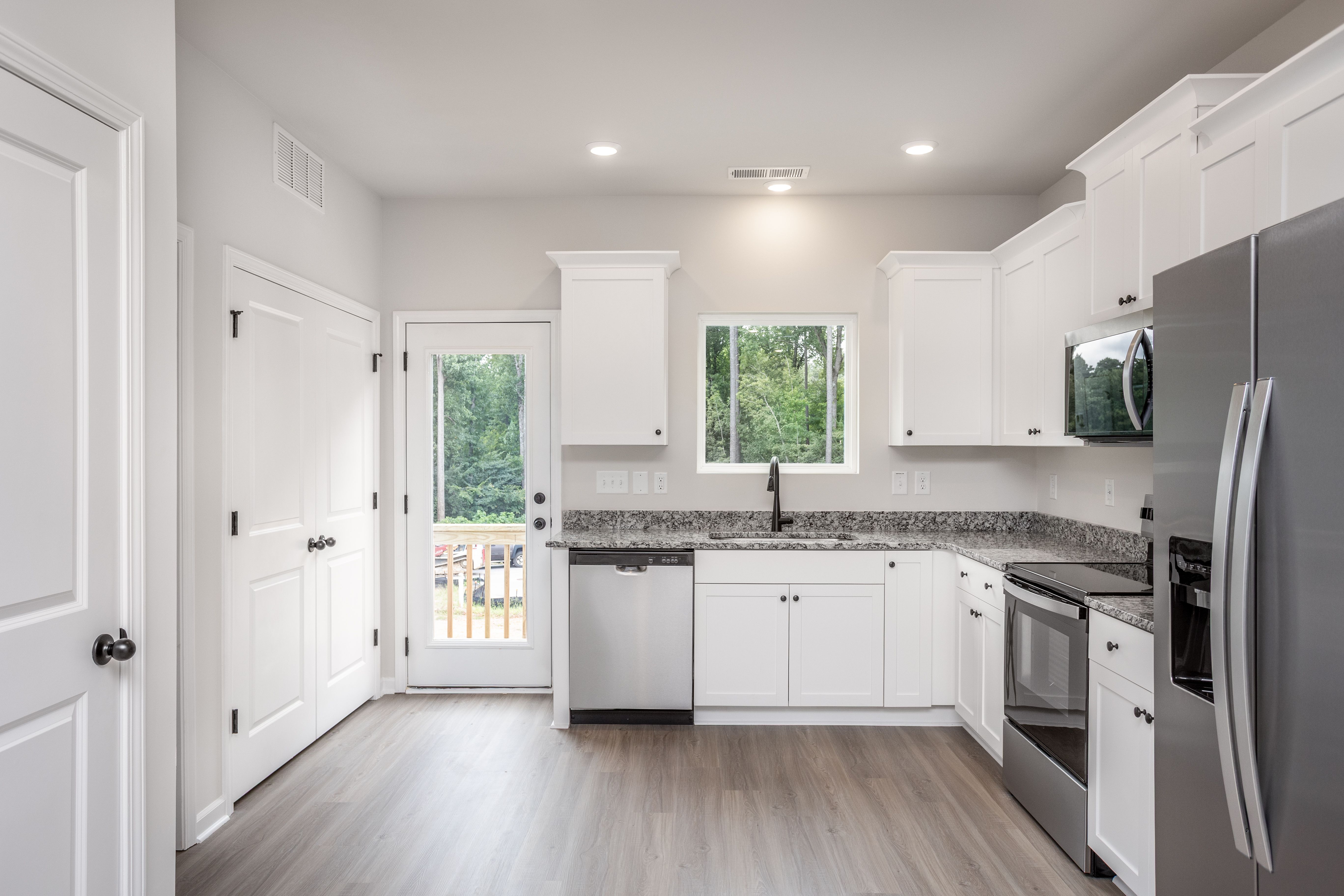 The living room connects to the kitchen. 