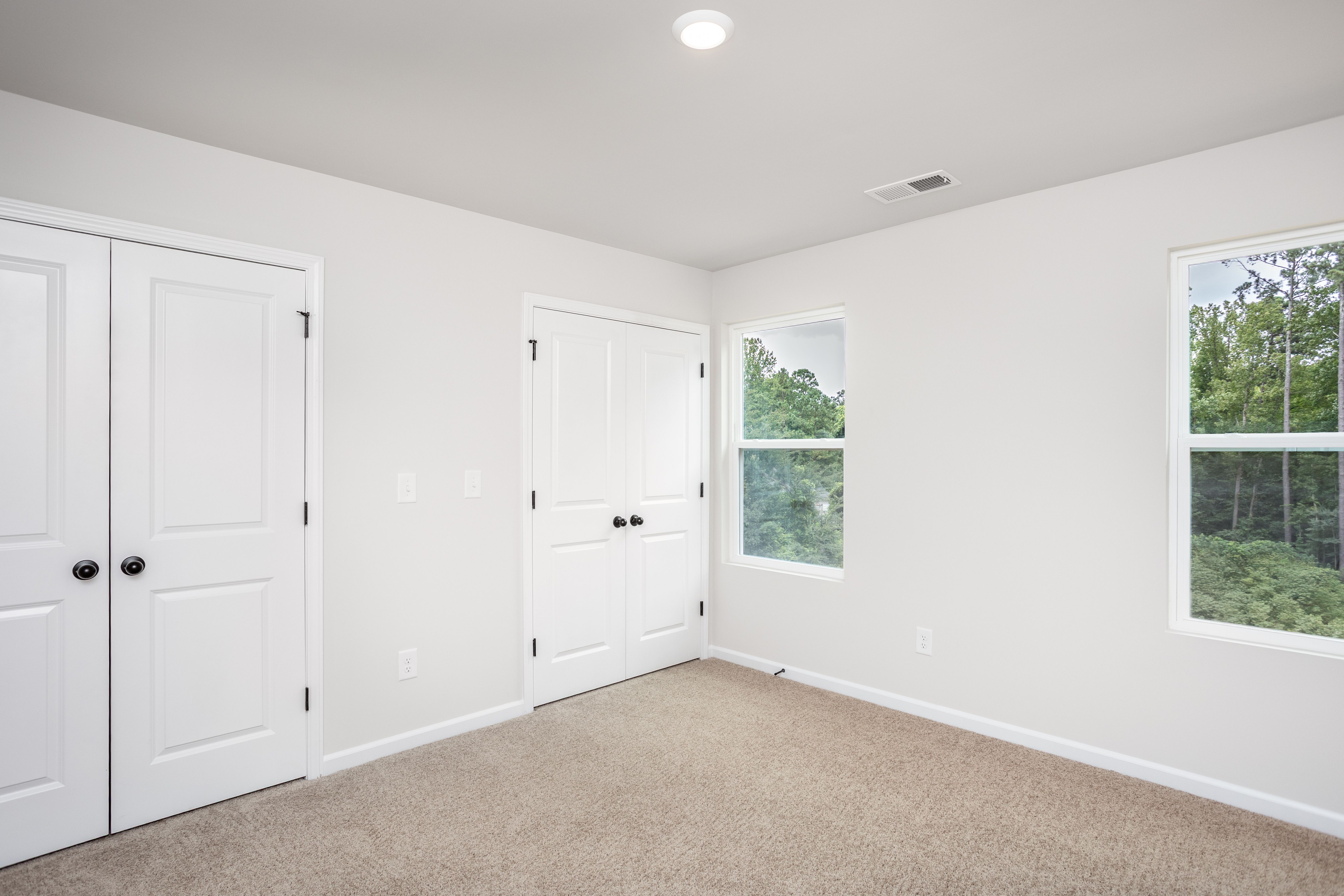 Each bedroom has windows. 