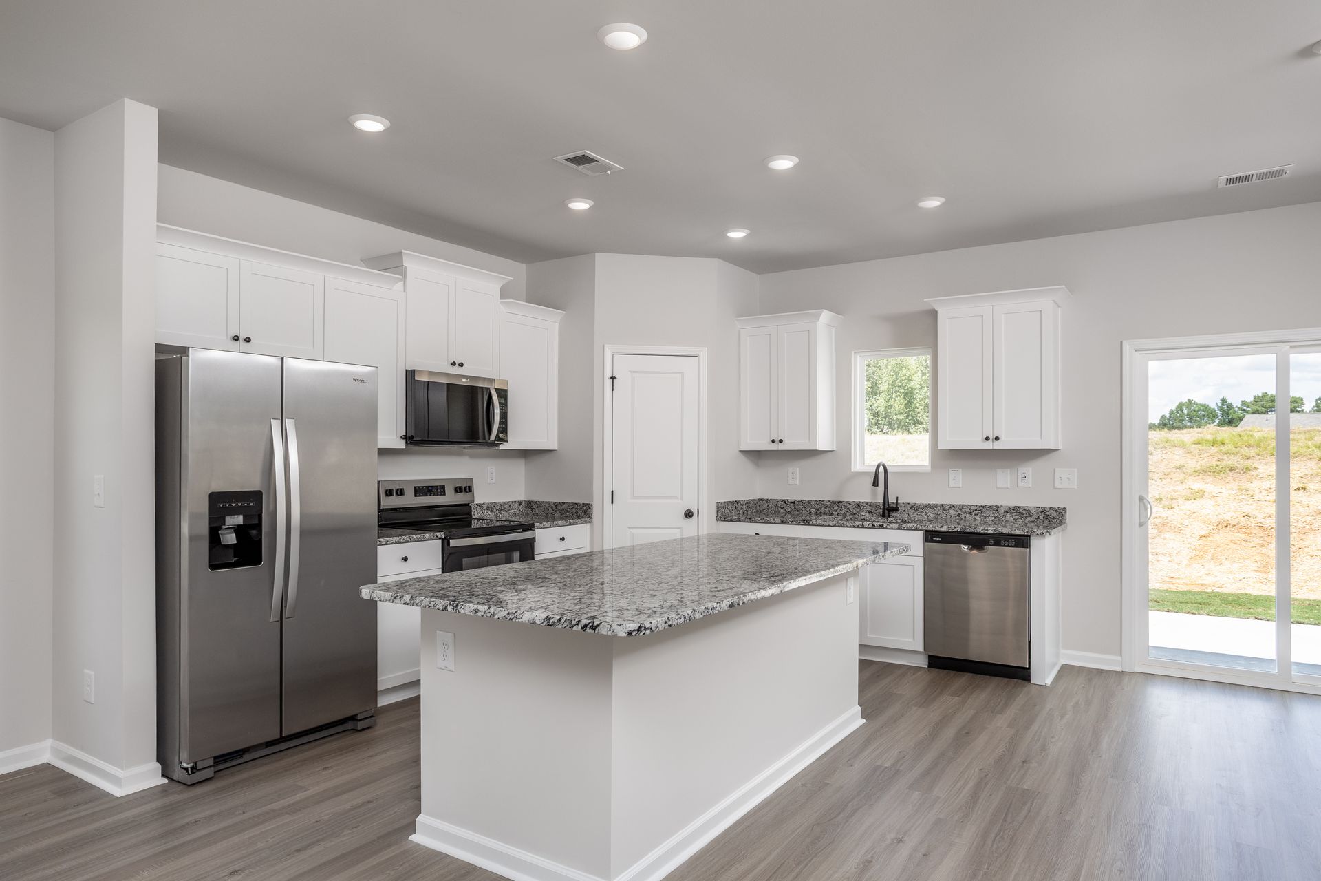 The kitchen has granite countertops.