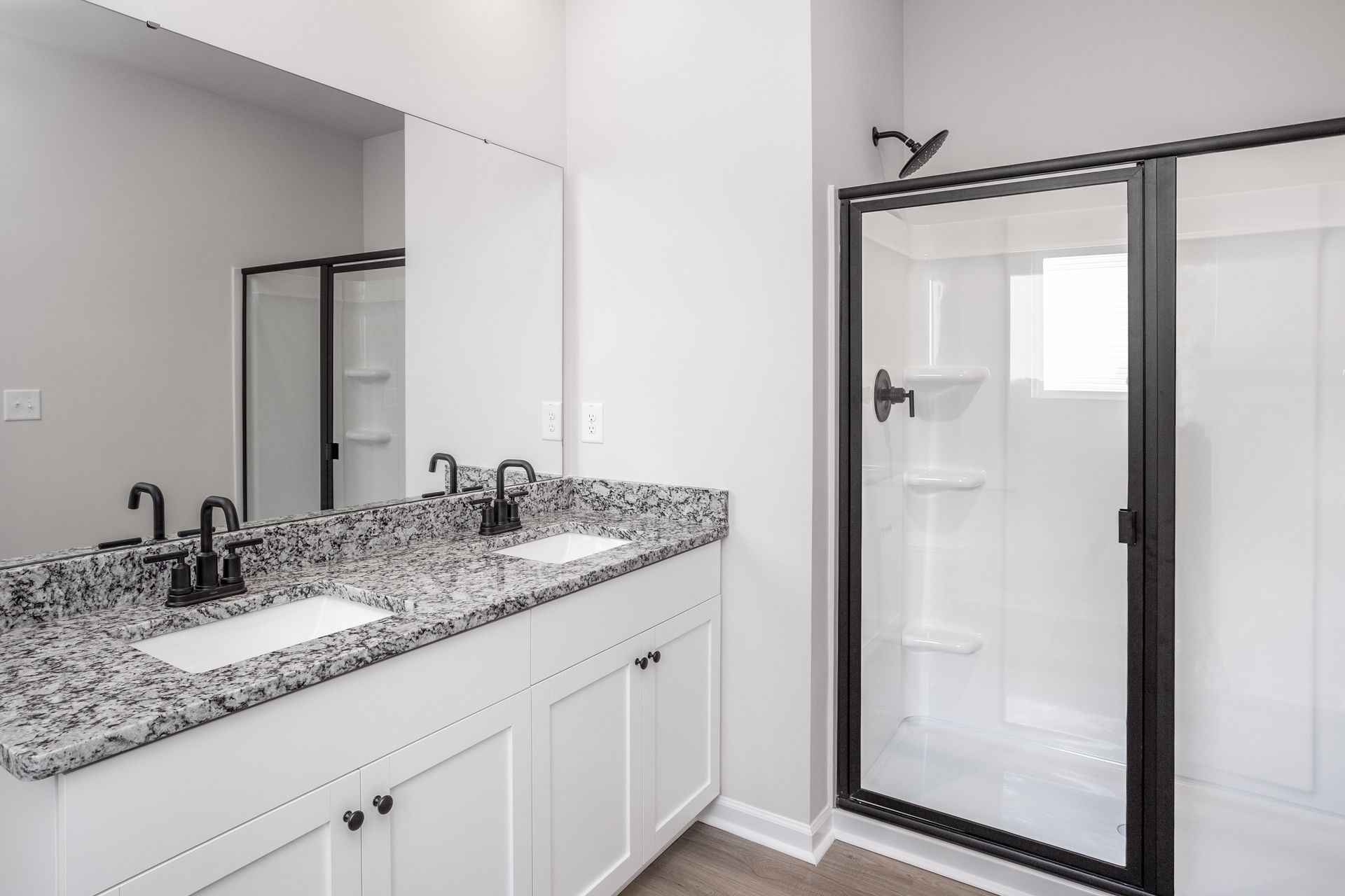The master bathroom has dual sinks