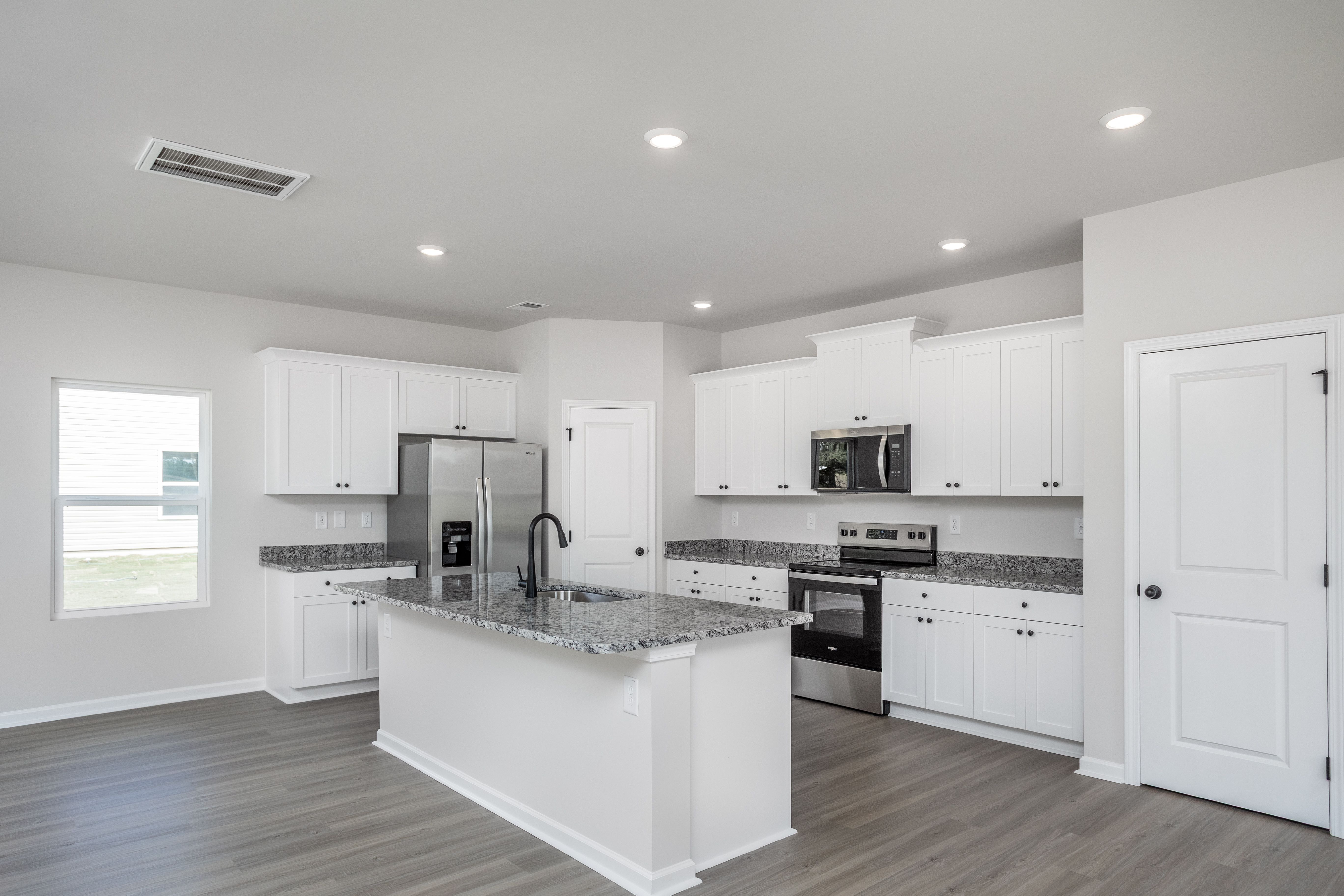 Kitchen overlooks the living area