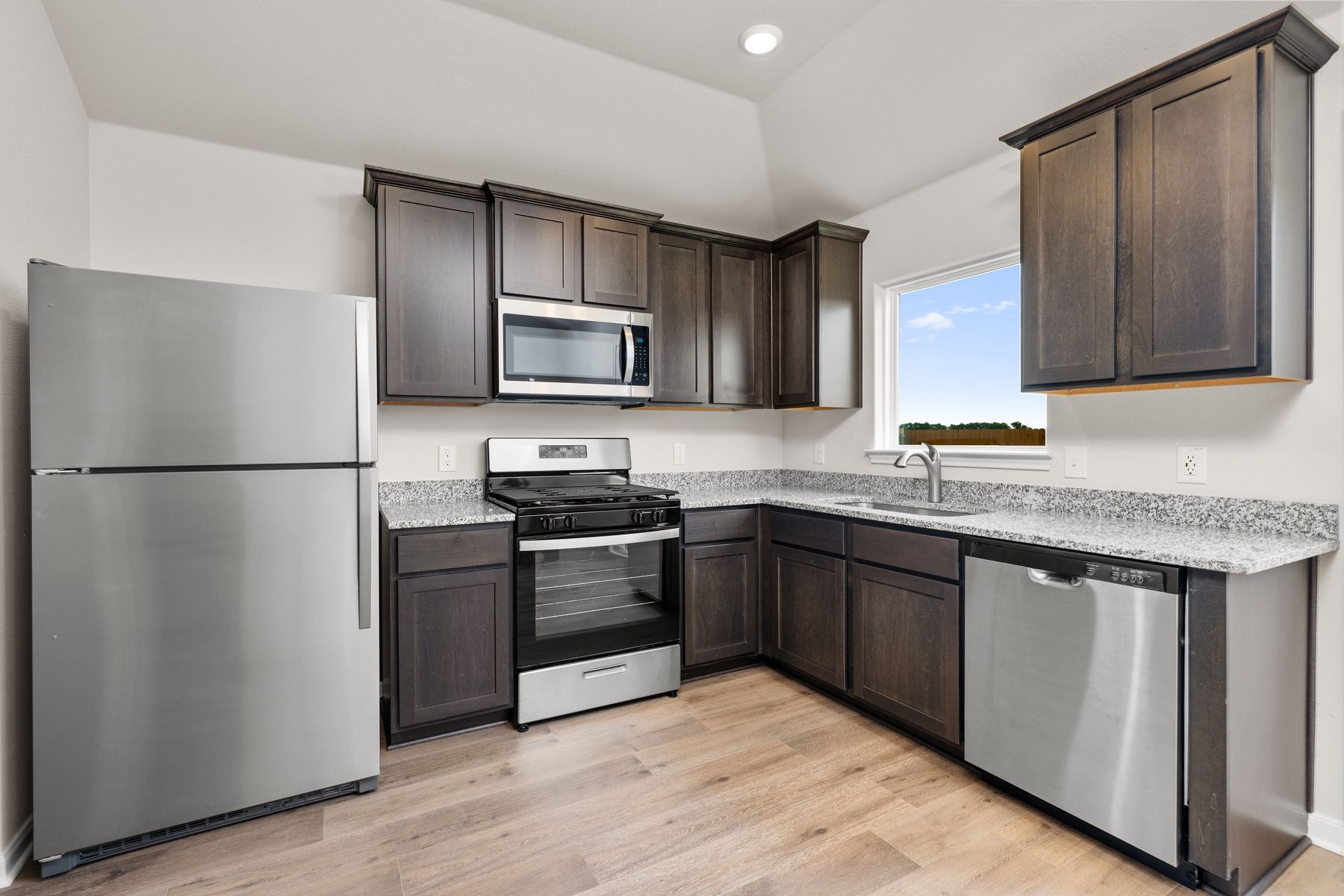 The kitchen has stainless-steel appliances.