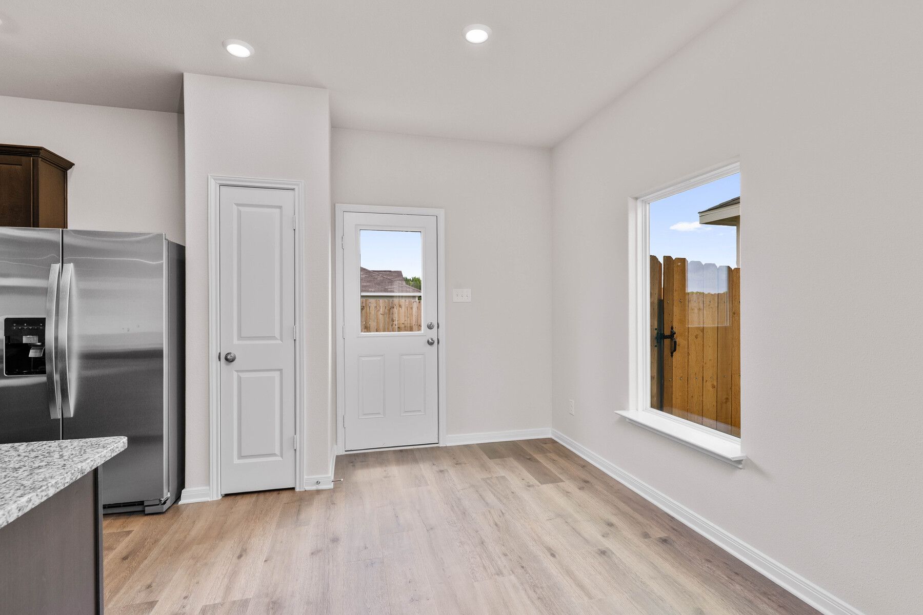 The dining room sits adjacent to the kitchen.