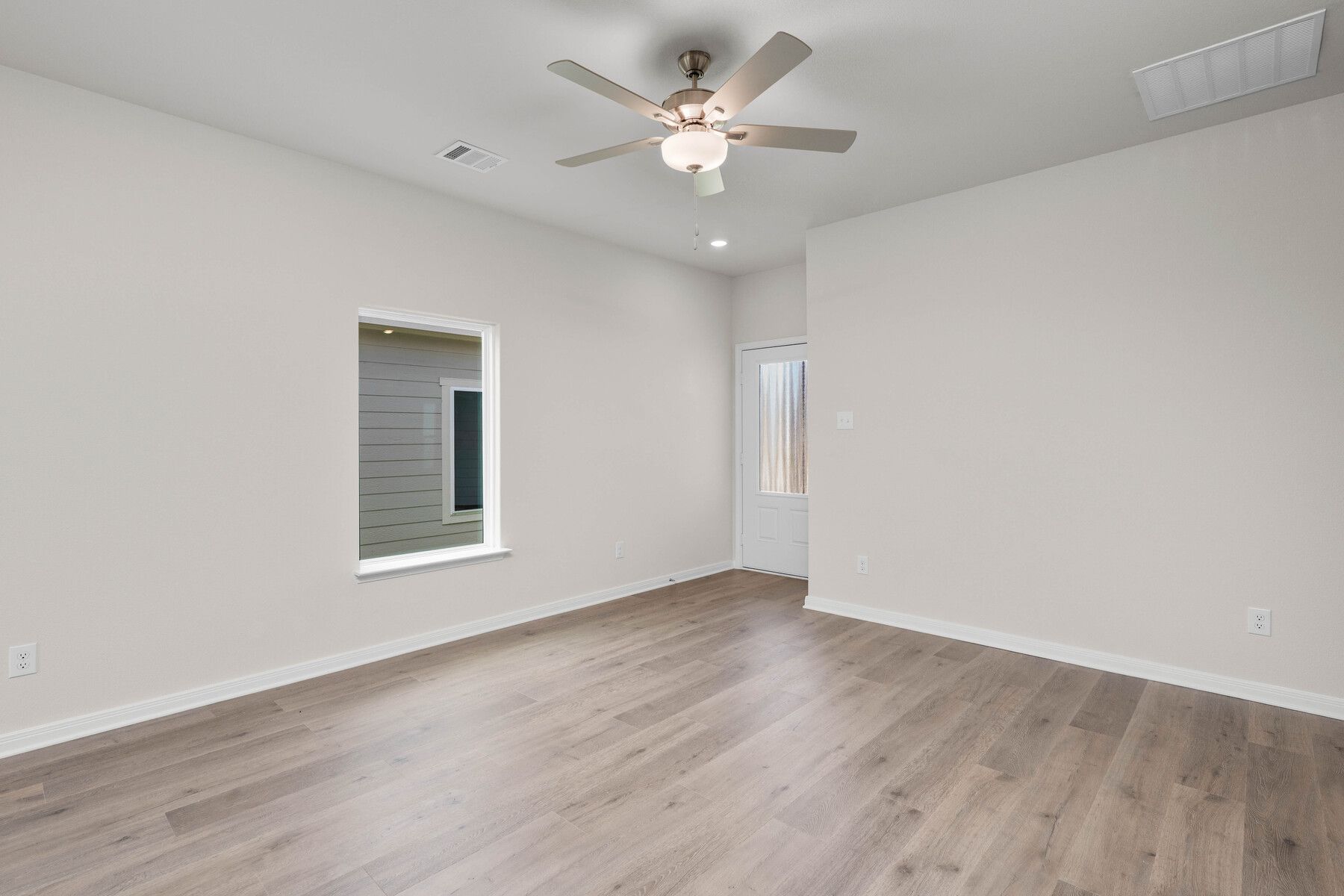 The front door leads right into the spacious living room.