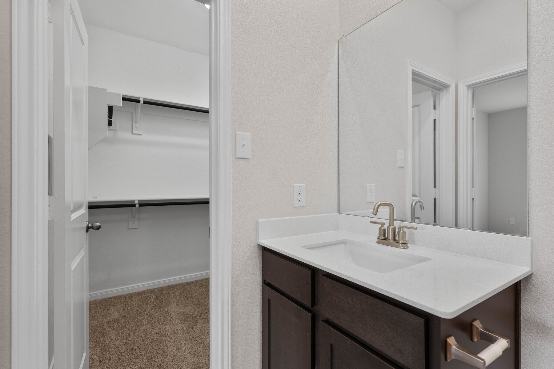 The walk-in closet is located in the master bathroom.
