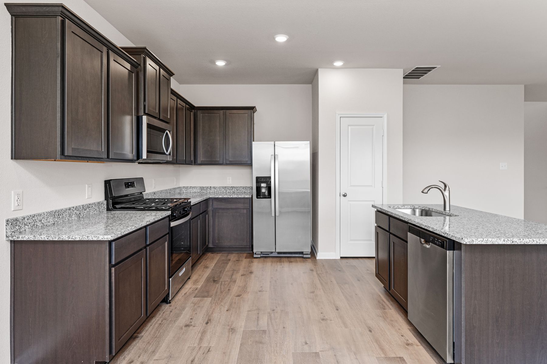 The spacious kitchen makes cooking meals easier than ever.