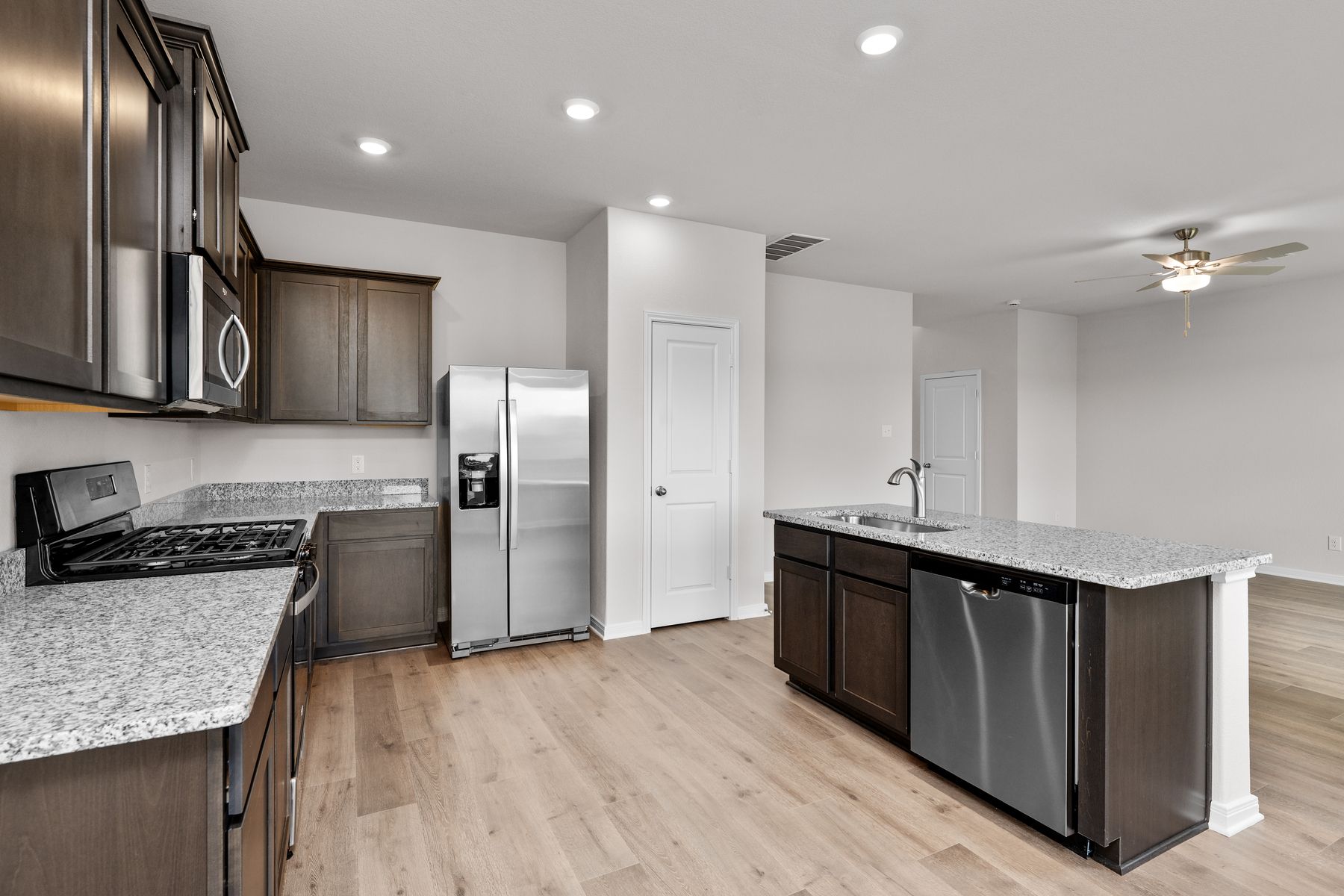 The kitchen has a pantry that is the perfect place to store food and other kitchen essentials.