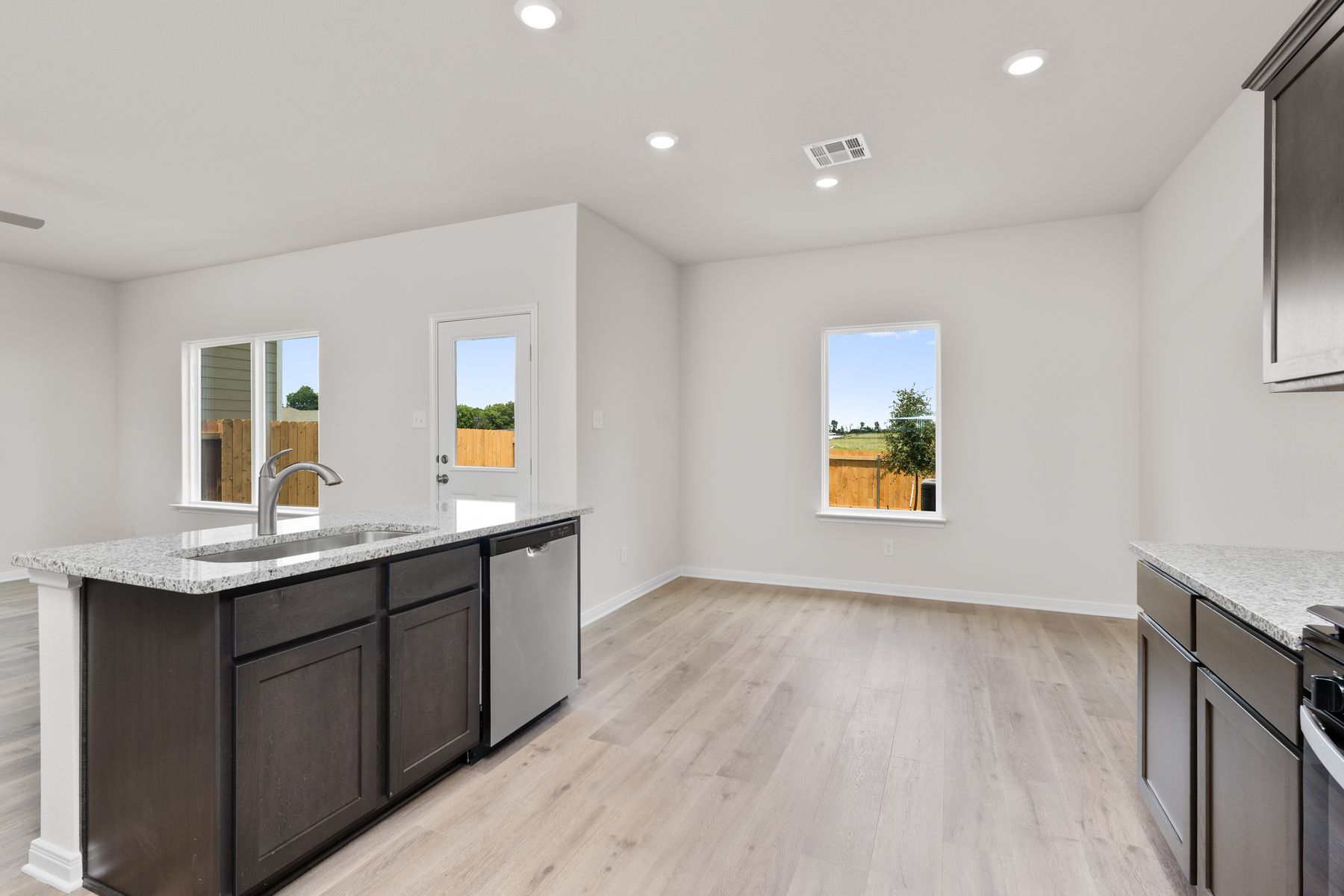 The dining room sits adjacent to the kitchen.