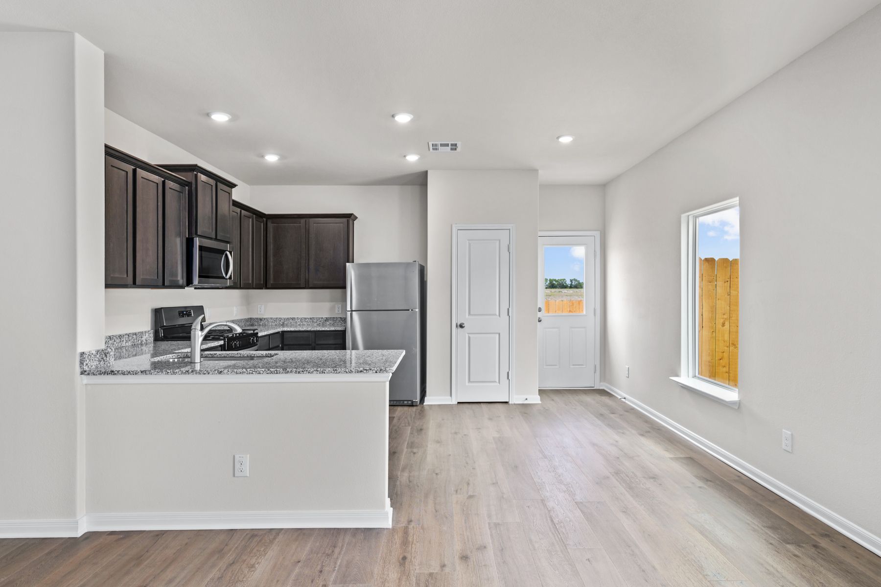 The dining room sits adjacent to the kitchen.