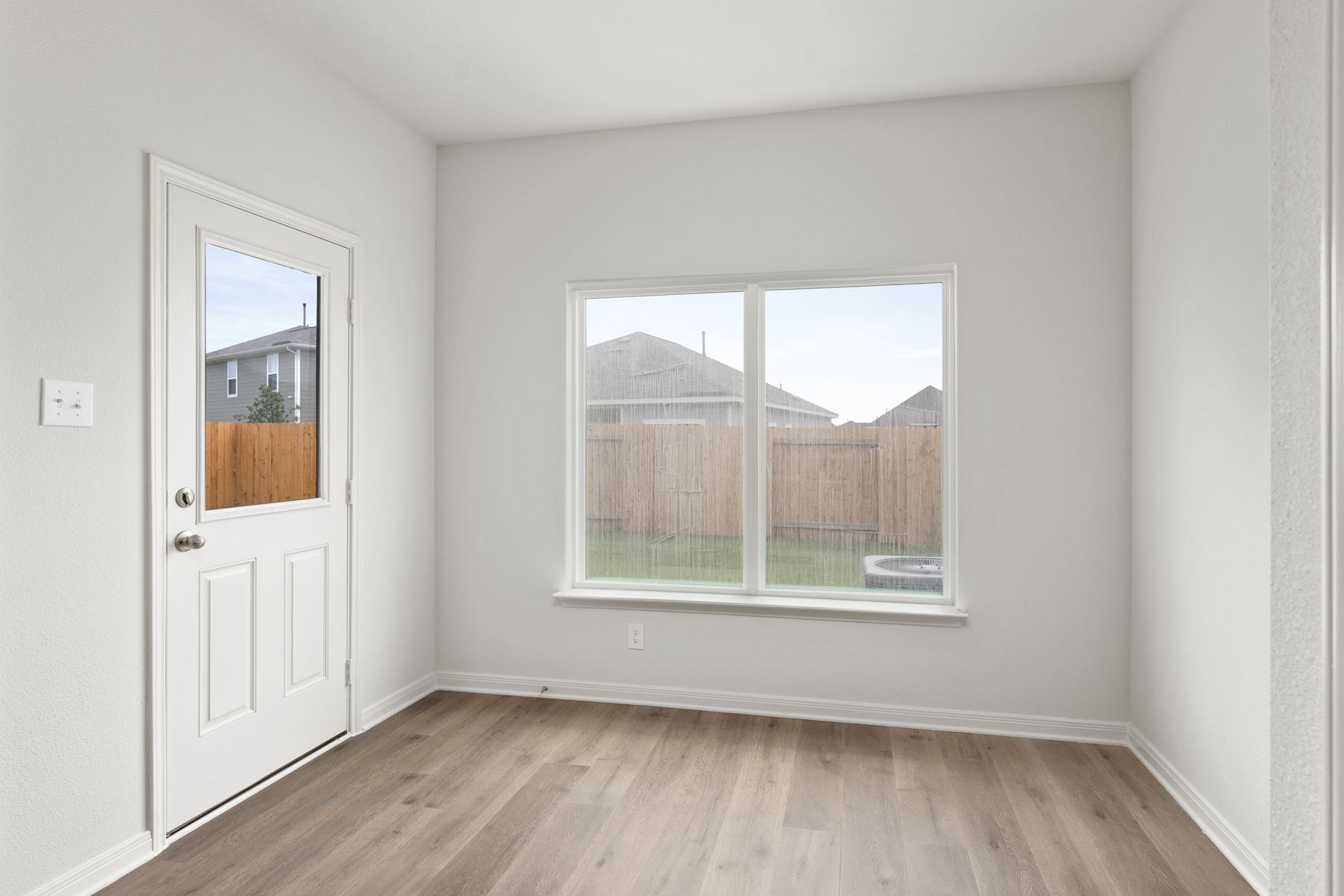 The dining room has a window that lets in great, natural light.