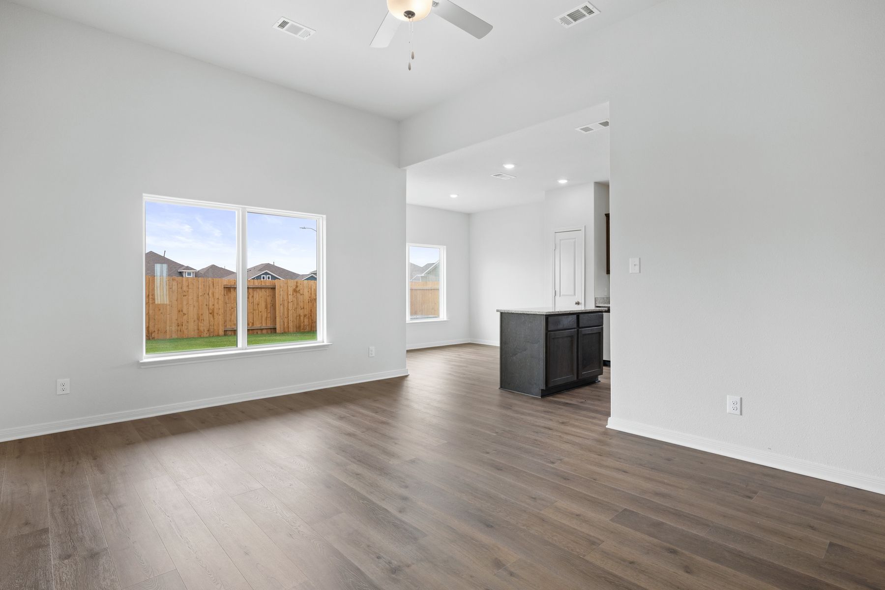 The family room has large windows that let in great, natural light.
