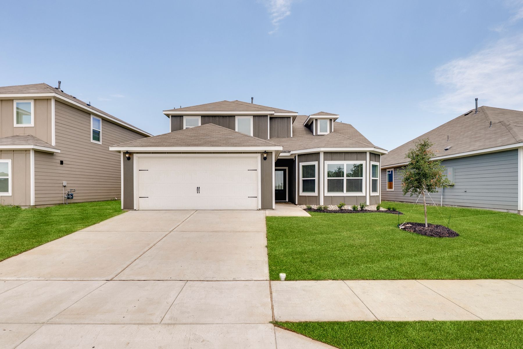 The Cypress is a beautiful two-story, siding home.