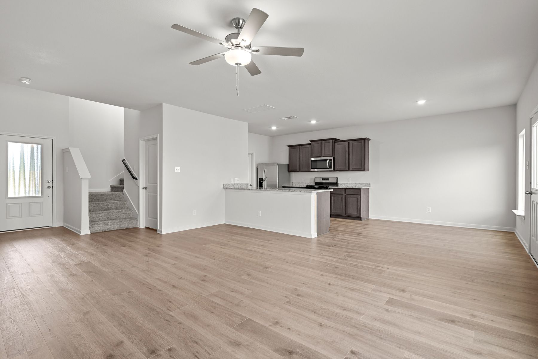 The family room sits adjacent to the kitchen and dining room.