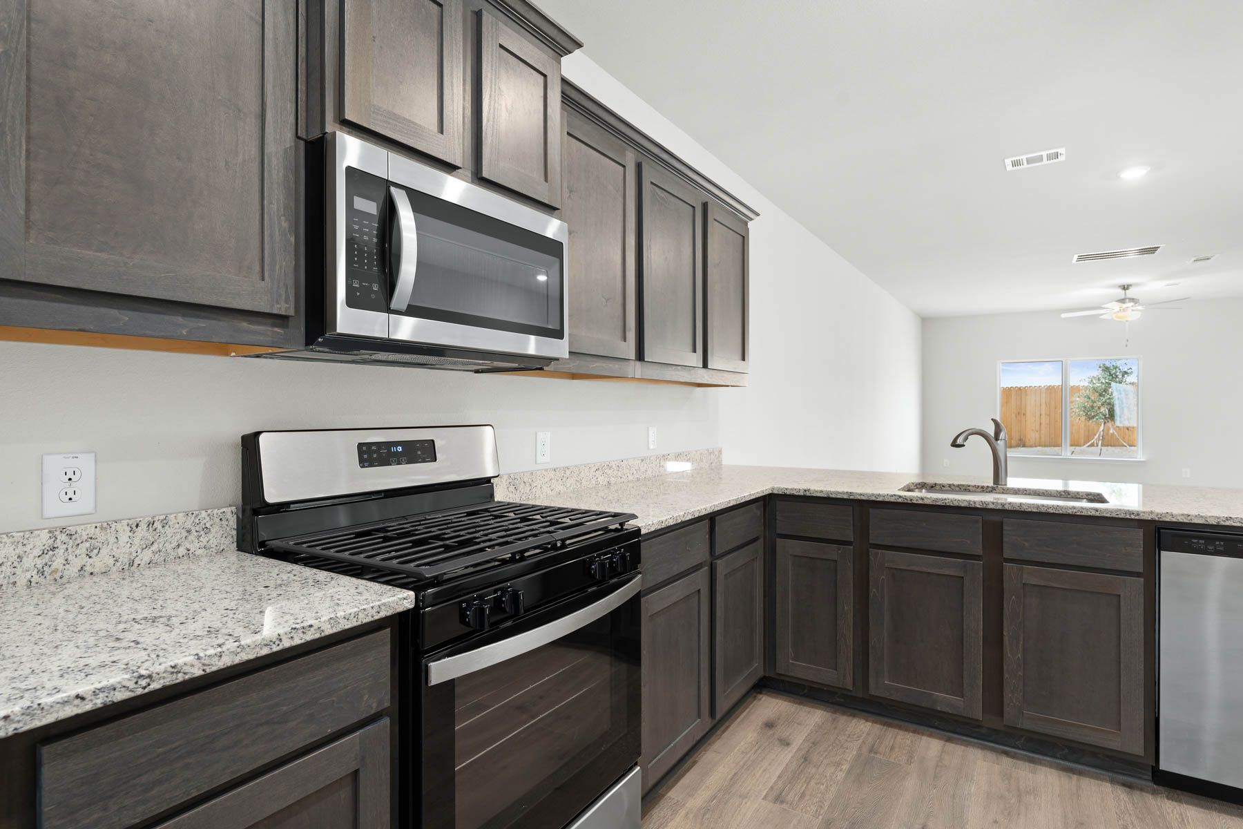 The kitchen of the Driftwood has stainless-steel appliances.