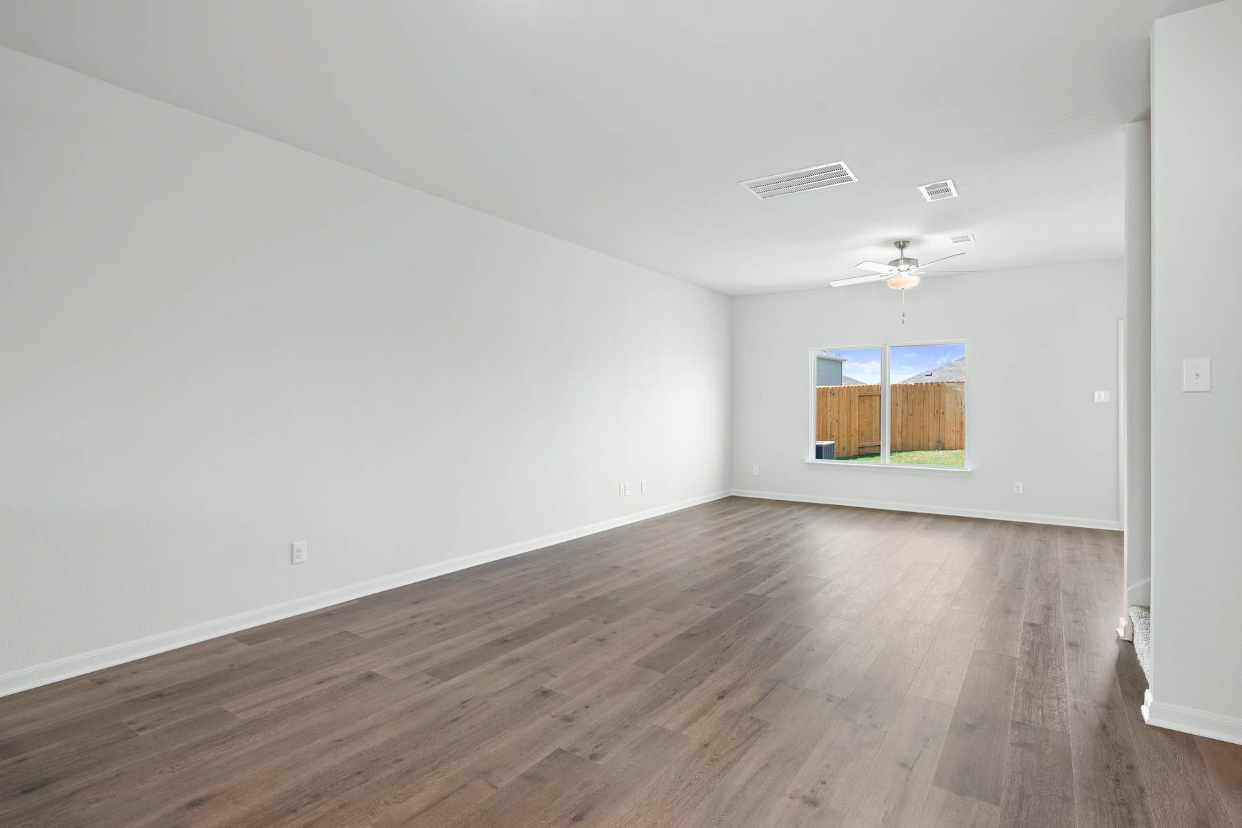 The family room of the Driftwood is spacious and has large windows.