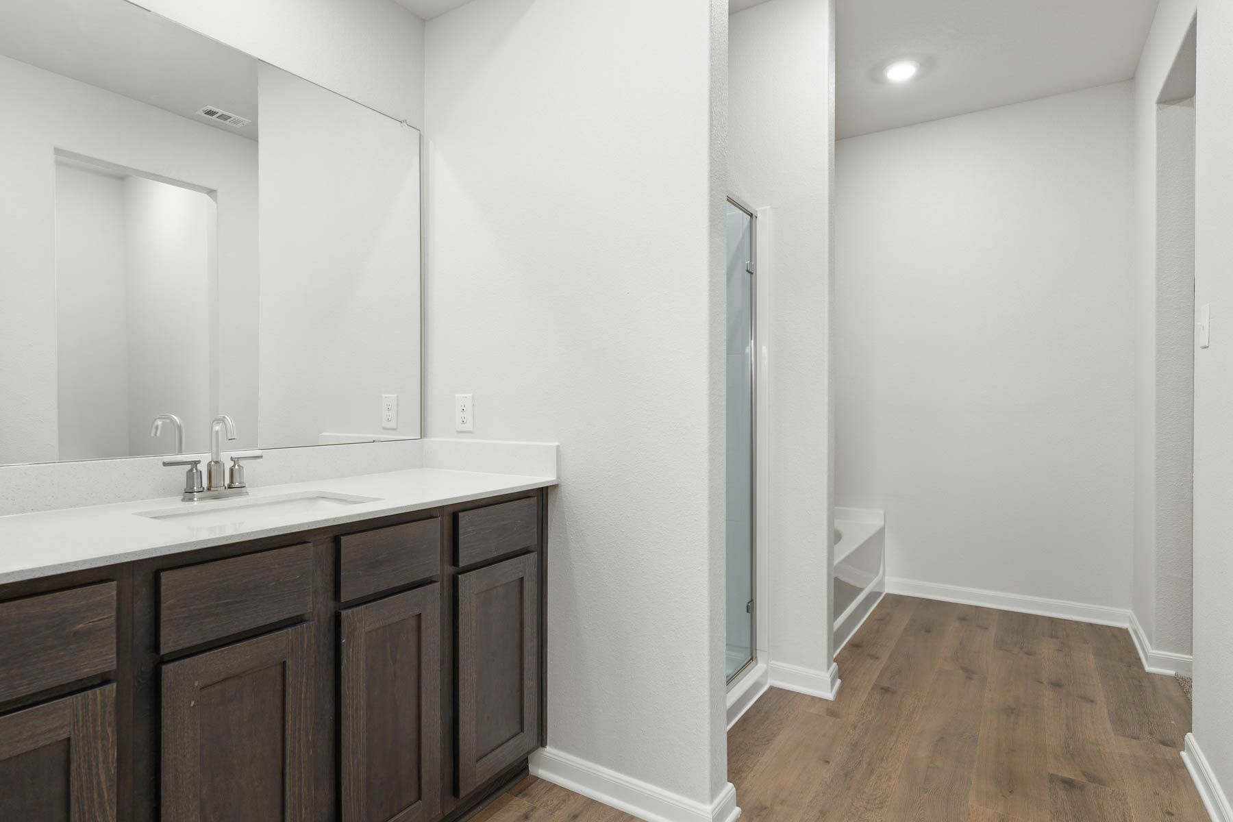 The master bathroom has a nice vanity space.