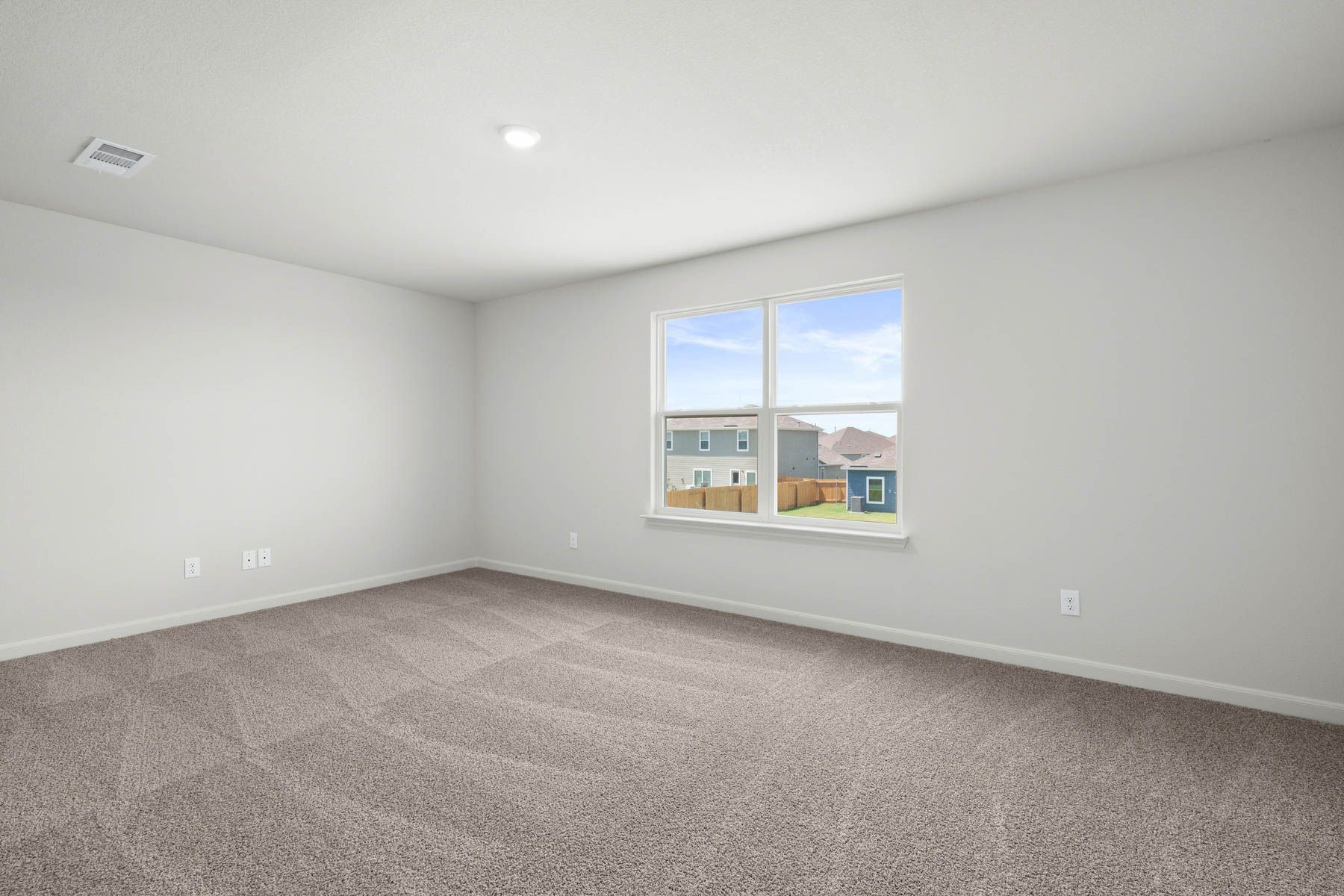The upstairs loft is a versatile space for the family to utilize to fit their needs.