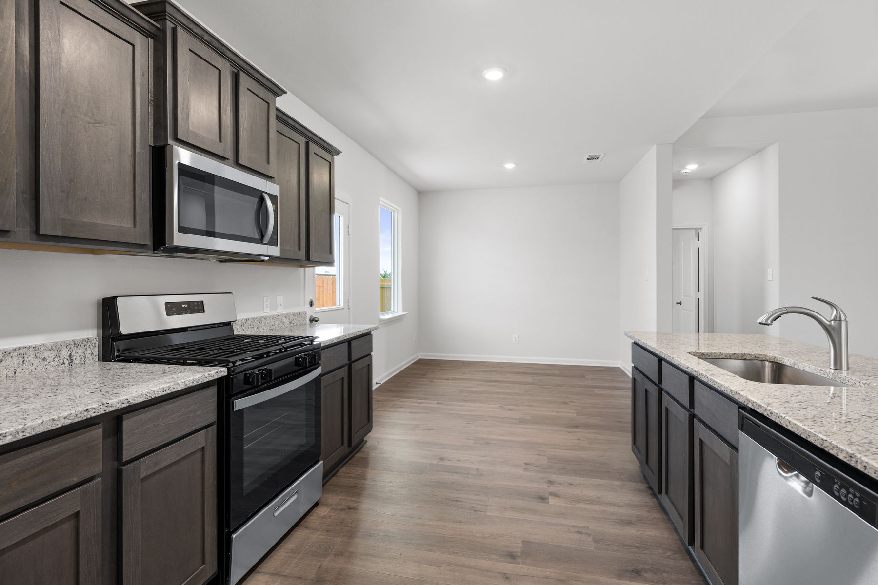 The kitchen of the Reed has sprawling granite countertops.