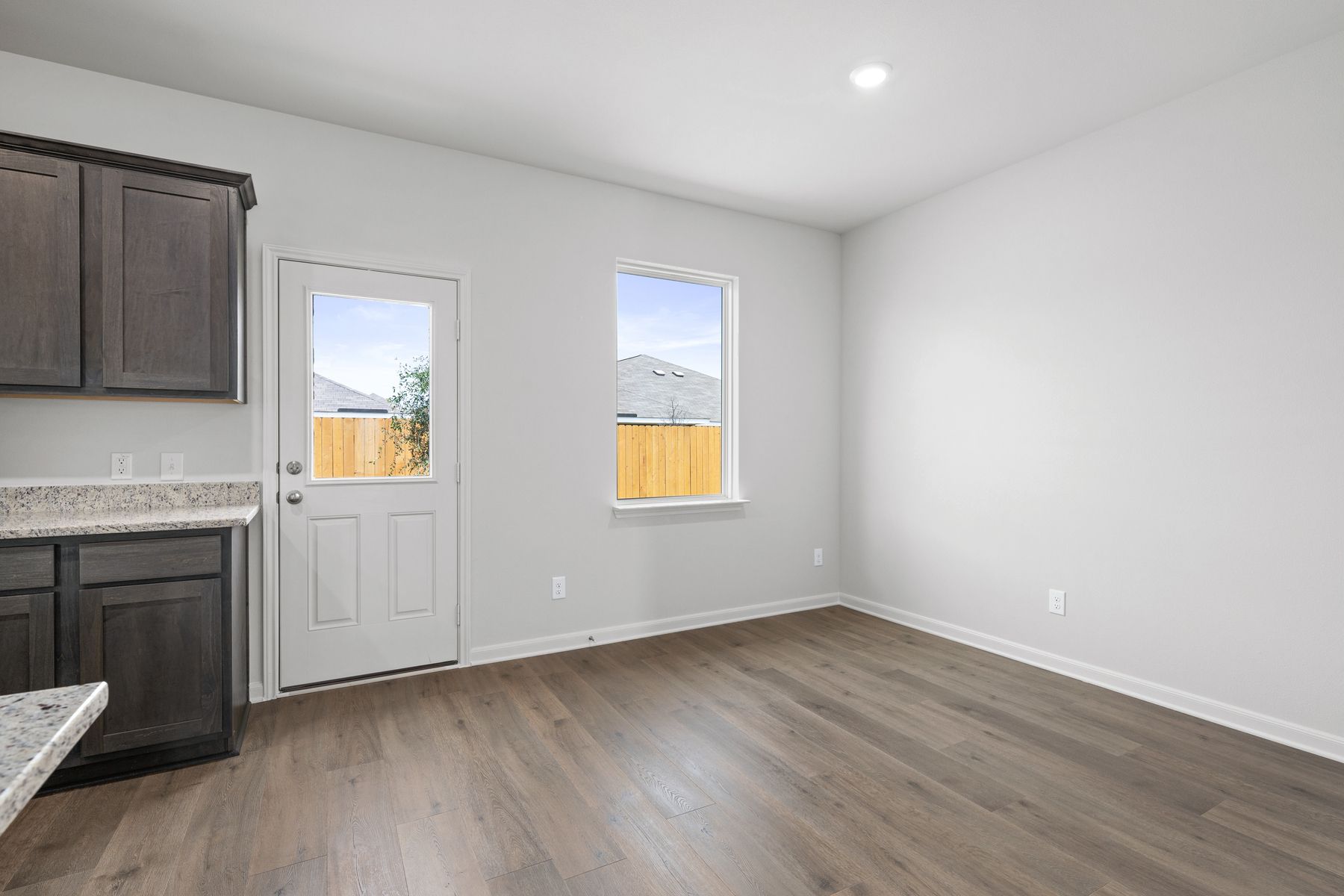 The dining room sits right off of the kitchen.