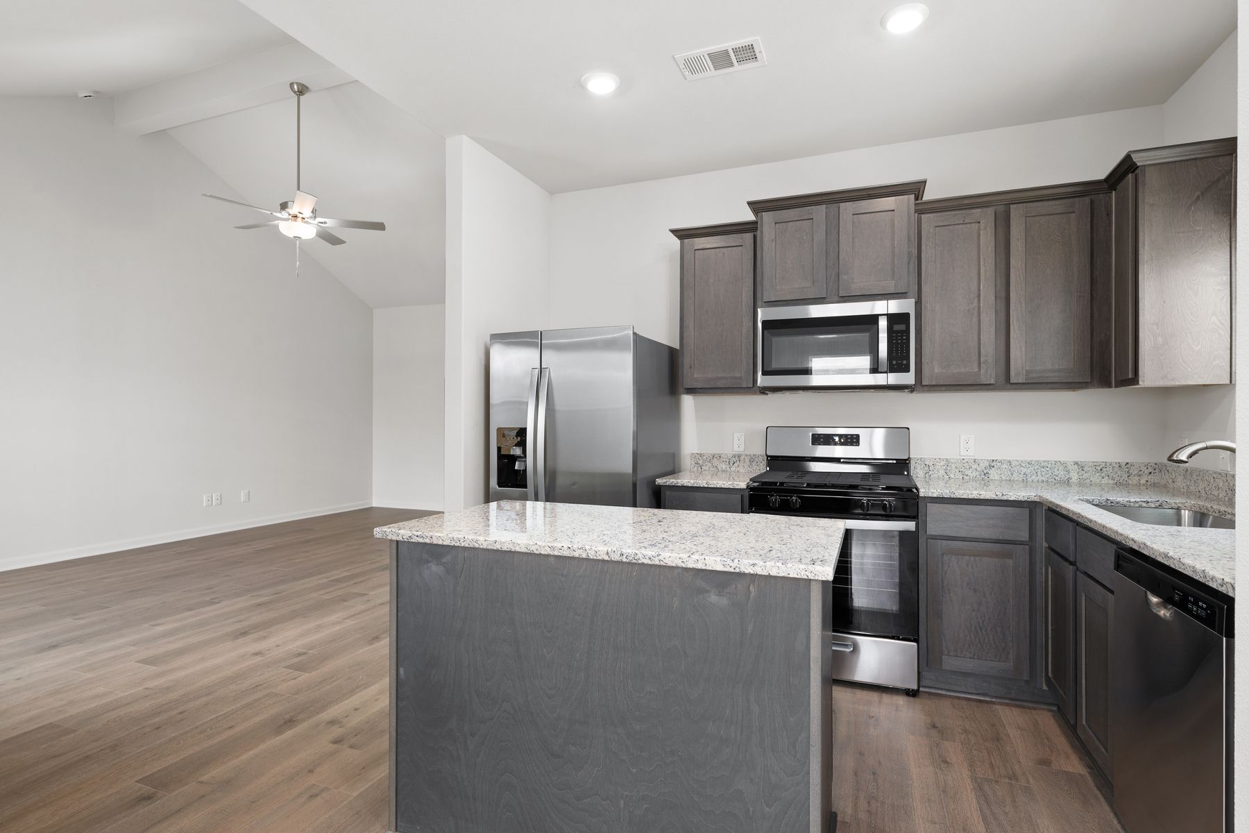 The kitchen of the Sabine has sprawling granite countertops.