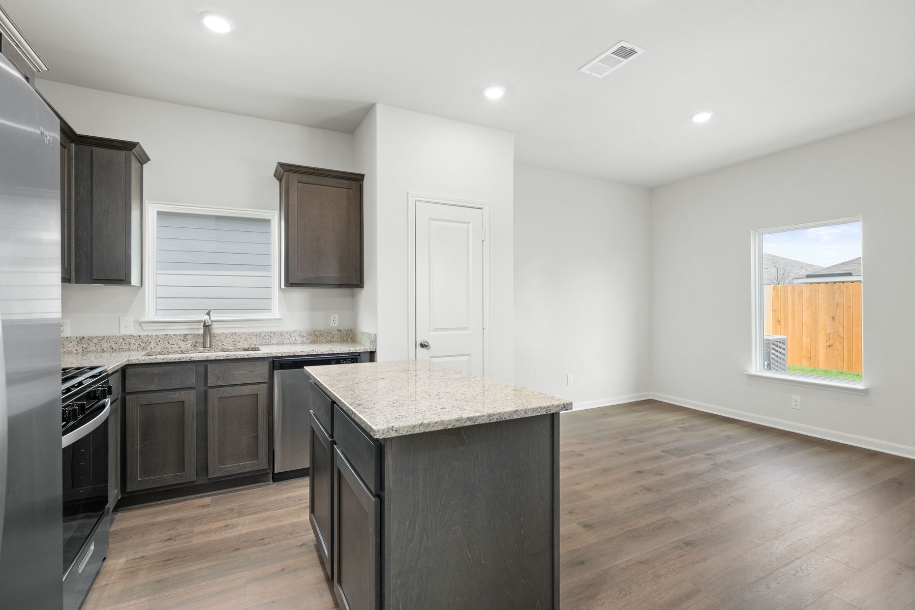 The dining room sits right off of the kitchen.