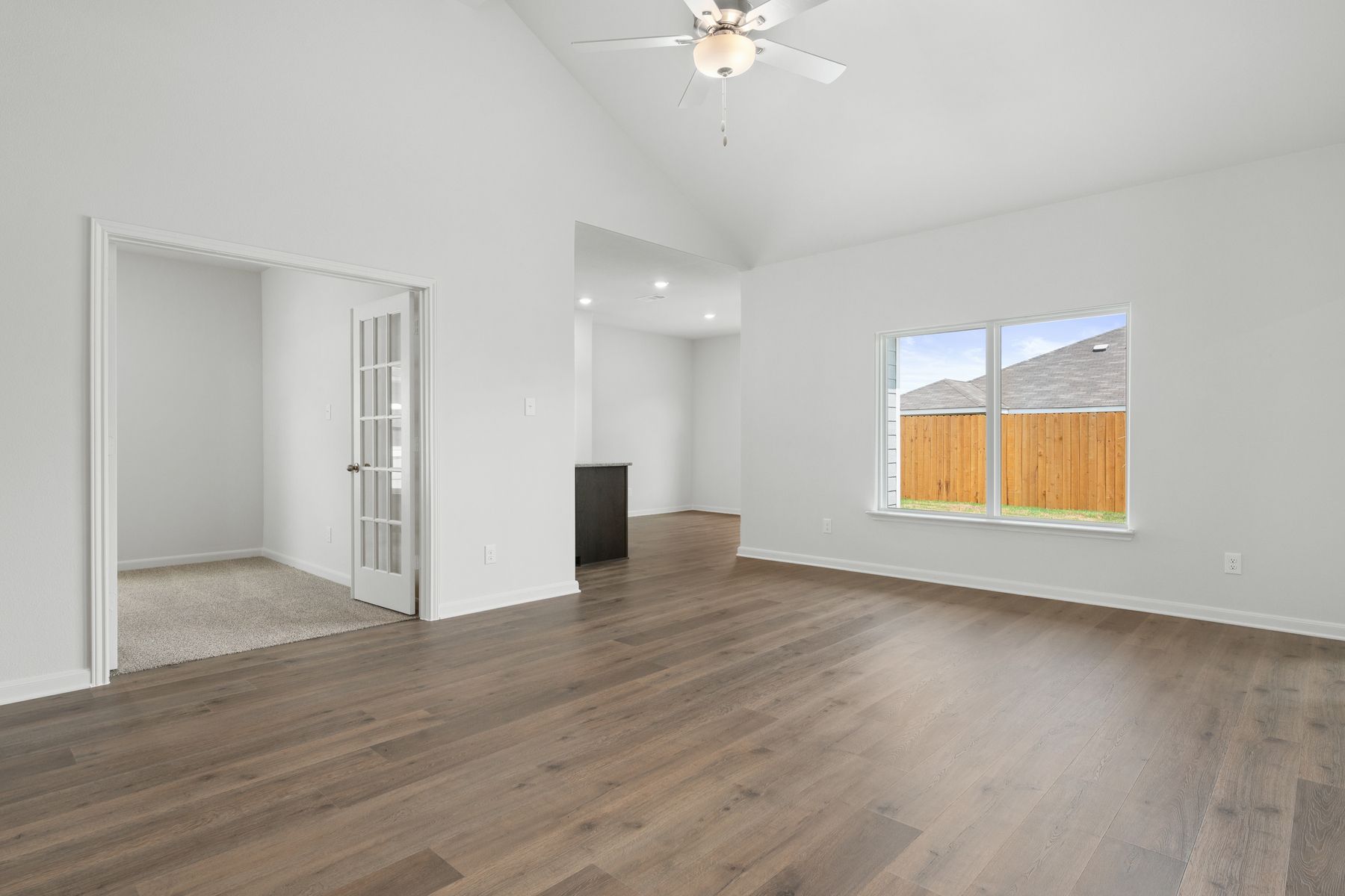 The family room of the Sabine has a large window.