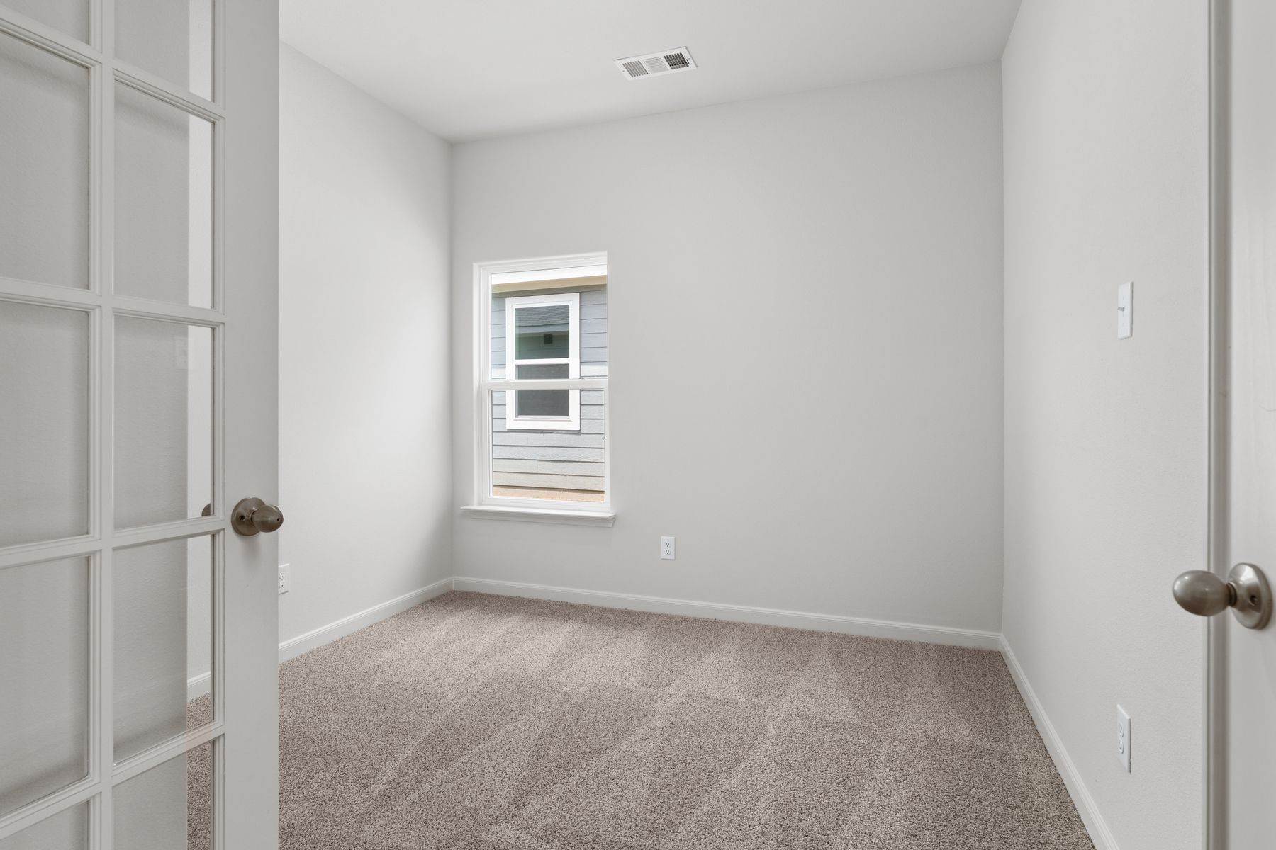 The flex room of the Sabine has a large window.