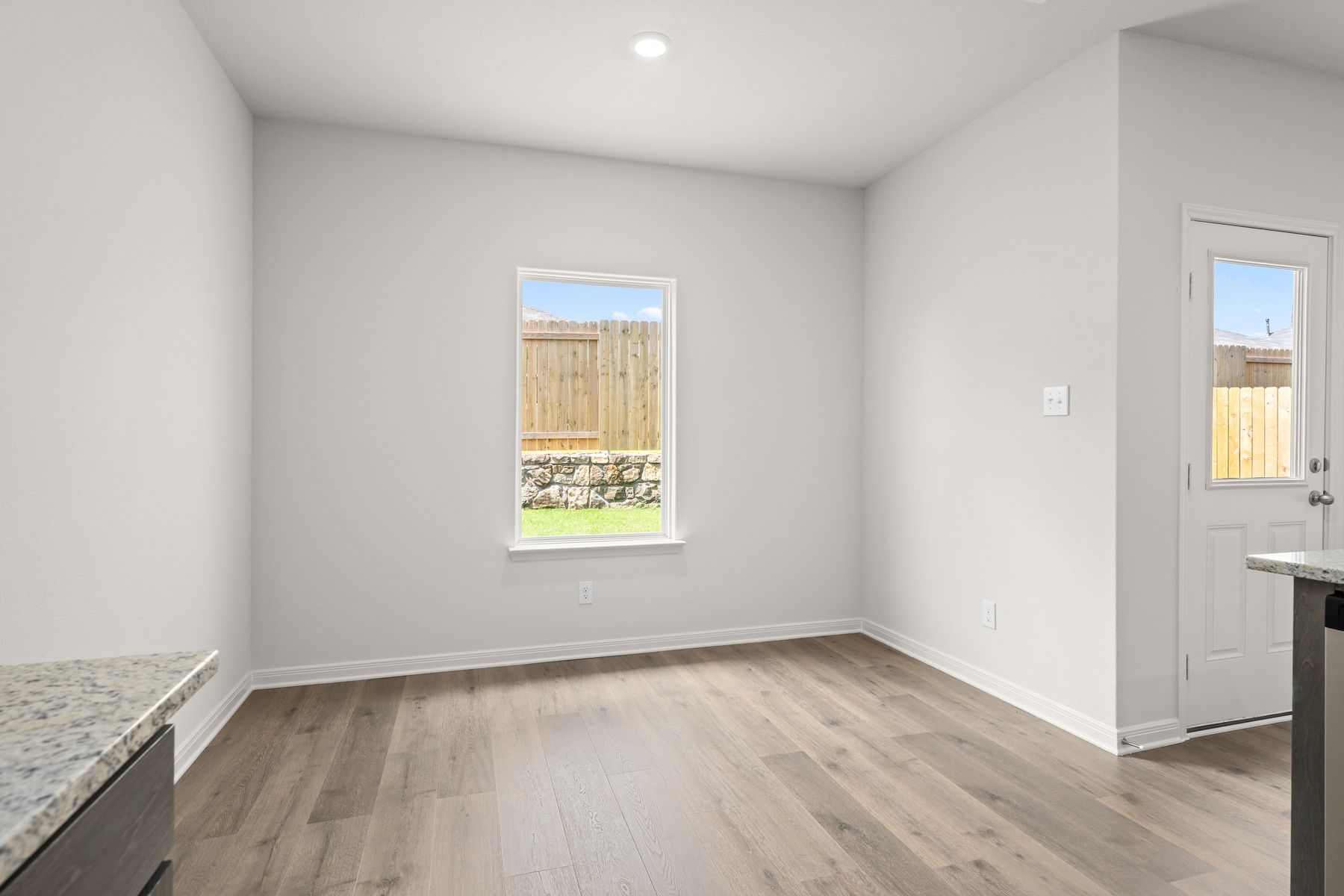 The dining room has a large window.