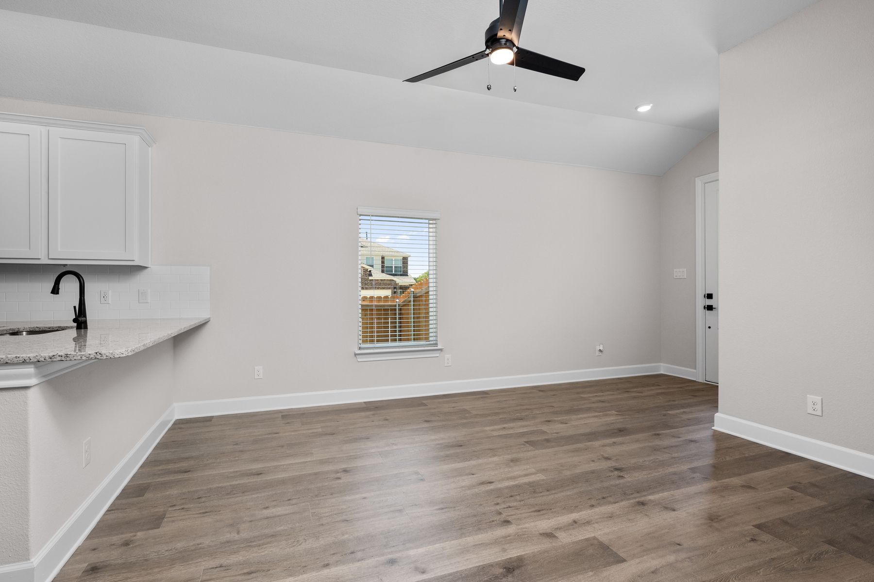 The family room has a window that lets in great, natural light.