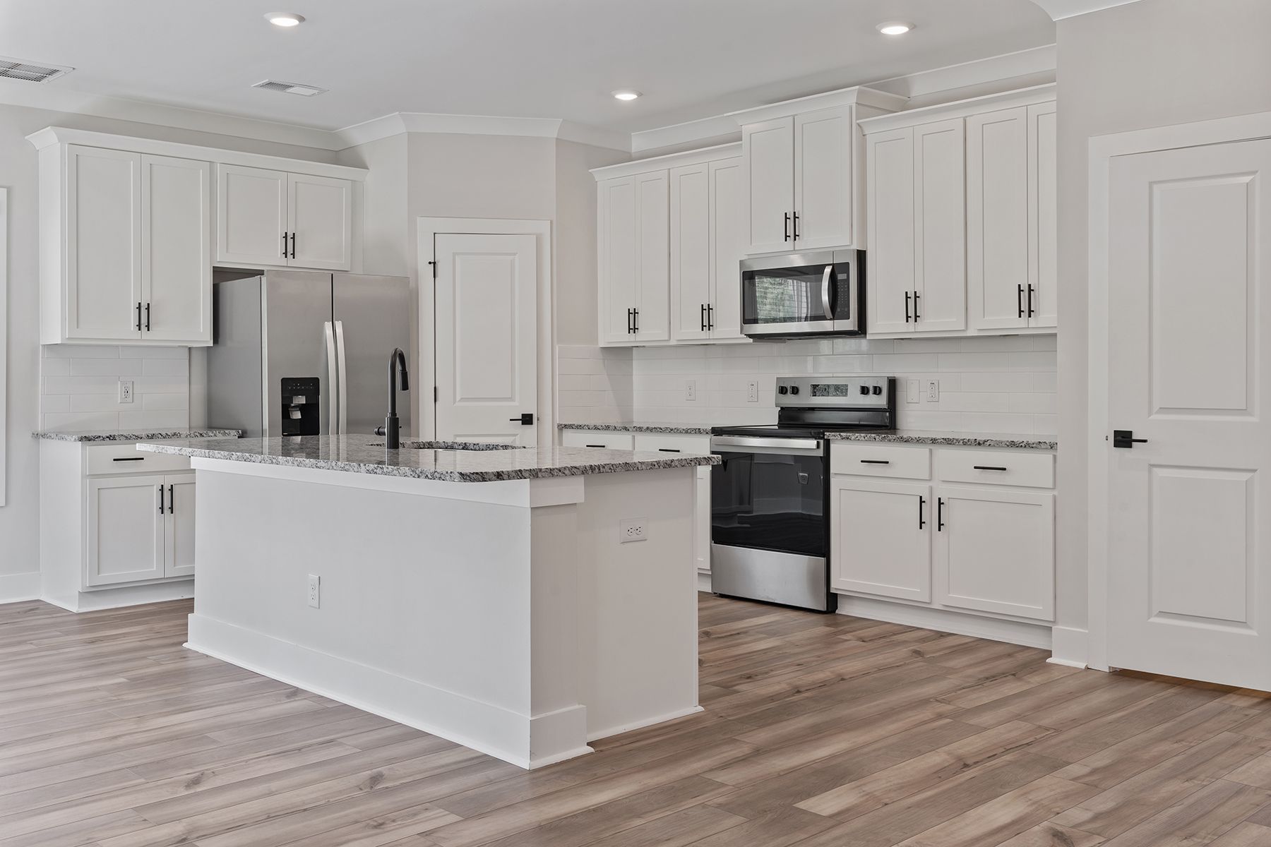 The kitchen has granite countertops 