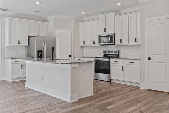 The kitchen has granite countertops