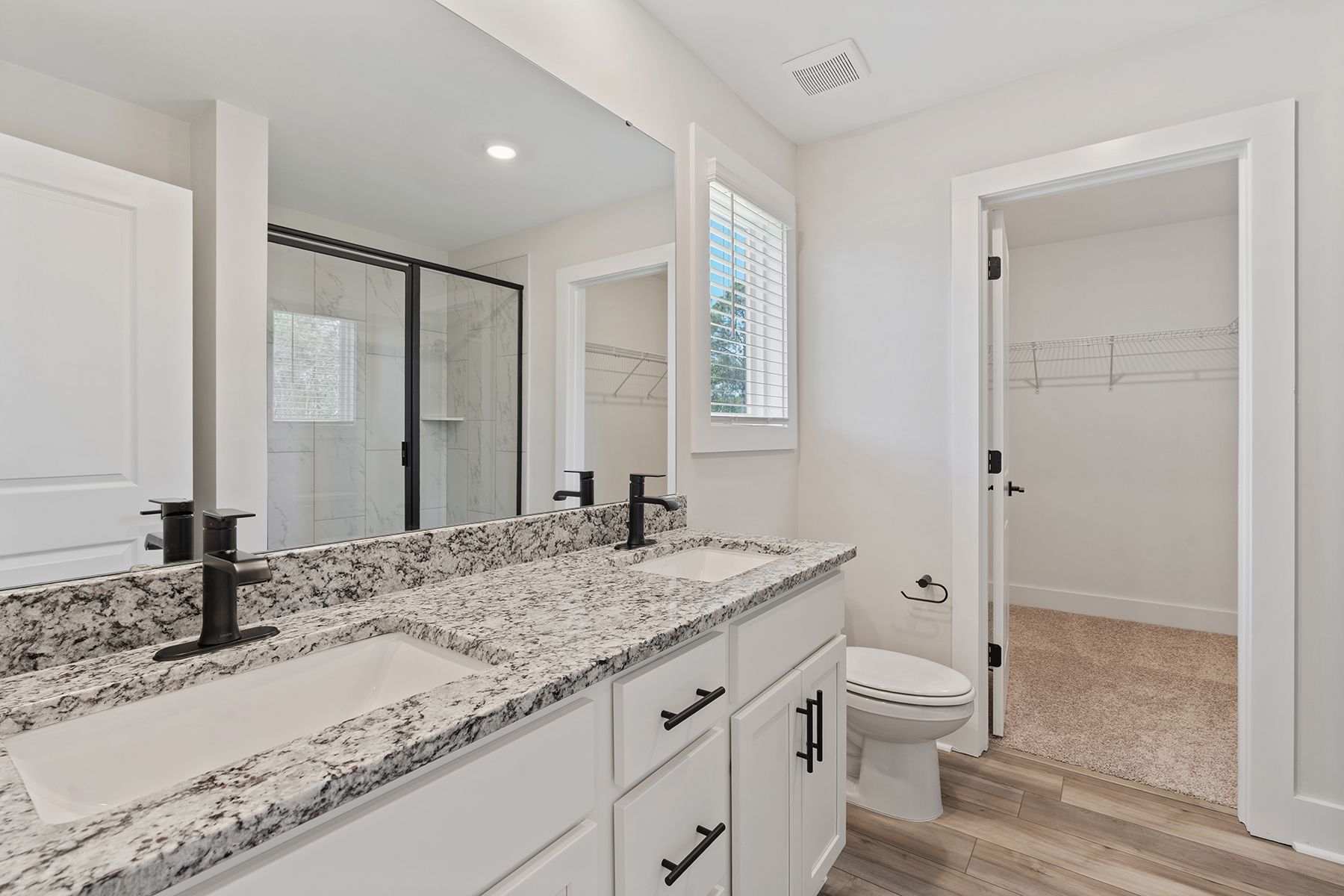 Master bathroom has dual sinks