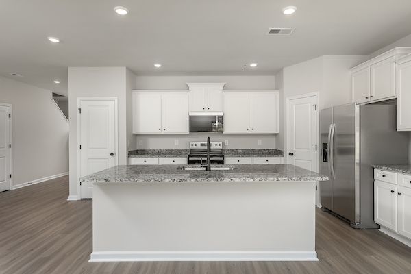 The kitchen comes with stainless-steel appliances