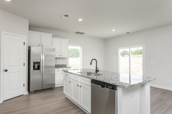 The kitchen has granite countertops