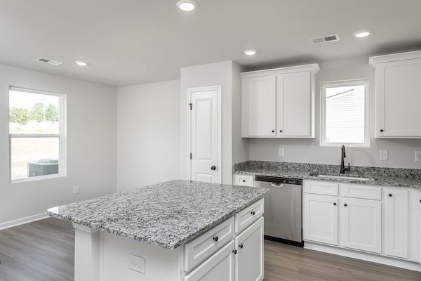 The kitchen overlooks the living area