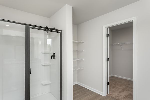 Glass-enclosed shower