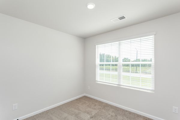 Windows let in lots of light to the bedrooms