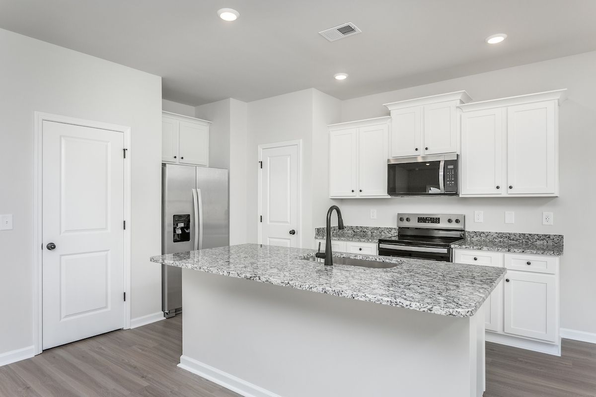 The kitchen comes with brand new stainless-steel appliances