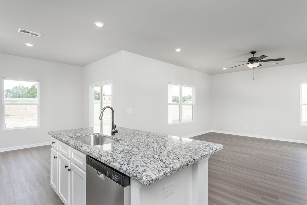 The kitchen is open to the living area