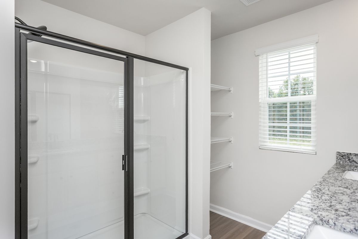 Glass-enclosed shower
