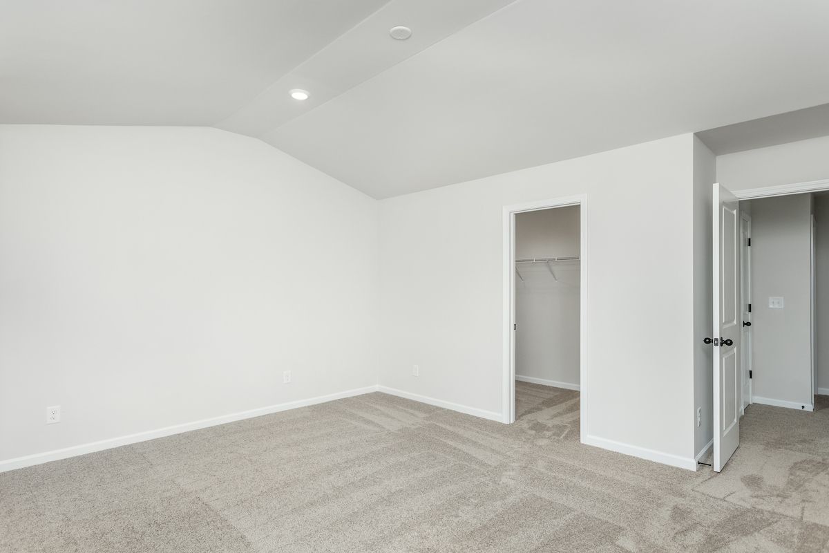 The master bedroom has cathedral ceilings.
