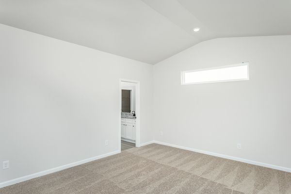 The master bedroom has plenty of space for king-sized furniture