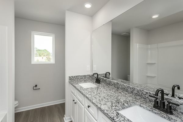 Windows let in lots of light to the bedrooms
