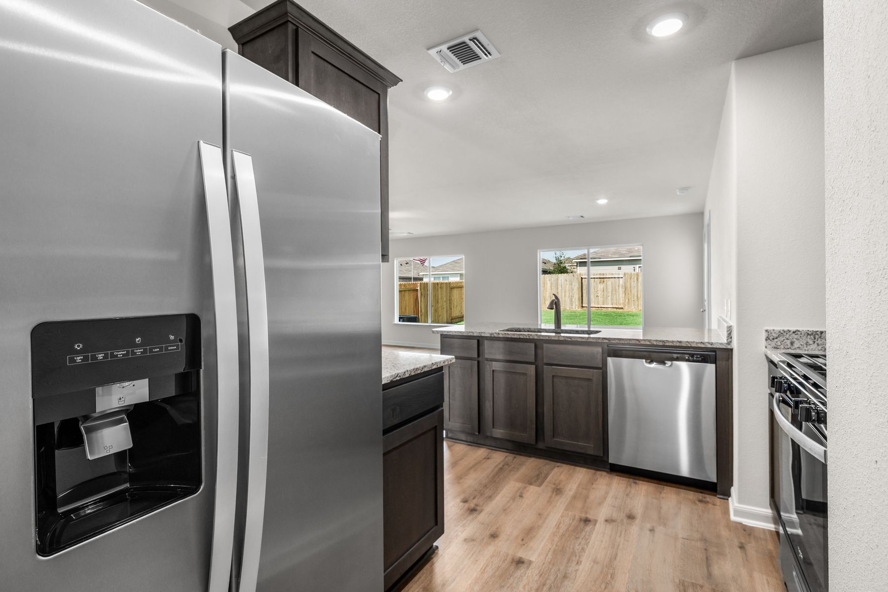 The kitchen has energy-efficient, stainless steel appliances.
