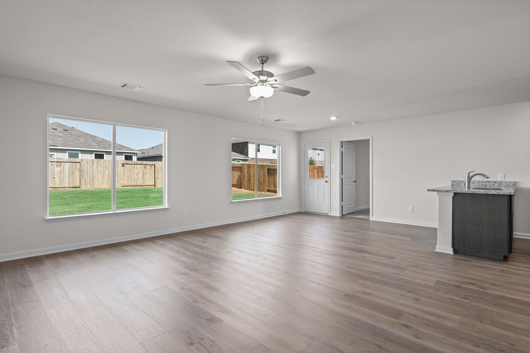 The family room and dining room have large windows that let in great, natural light.